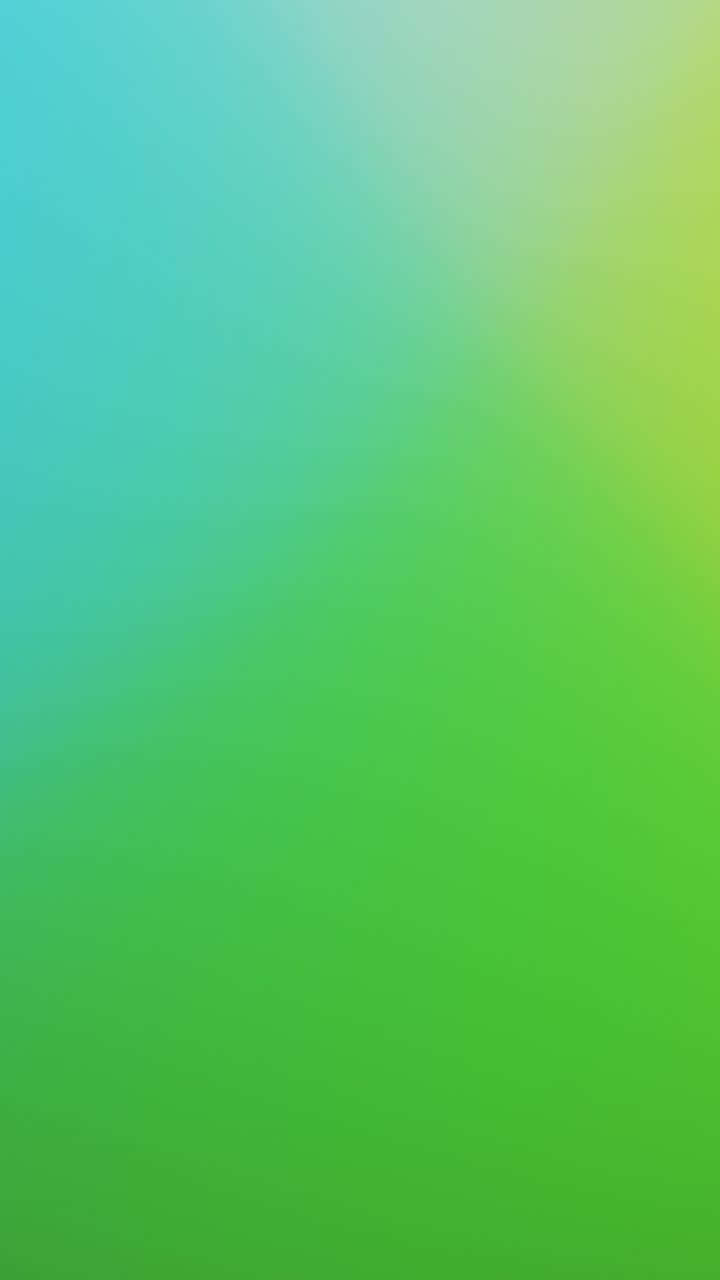 Green Gradient 桌布 壁紙 — 整個畫面呈現由冷調青綠色到充滿活力的萊姆綠的平滑漸變。