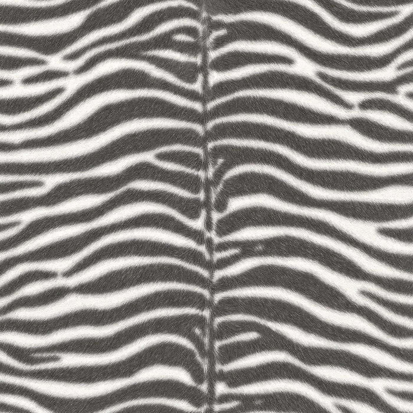 Animal Fur 桌布 壁紙 — 斑馬紋圖案布料的特寫，帶有醒目的黑白波浪條紋，中央有可見的縫線。