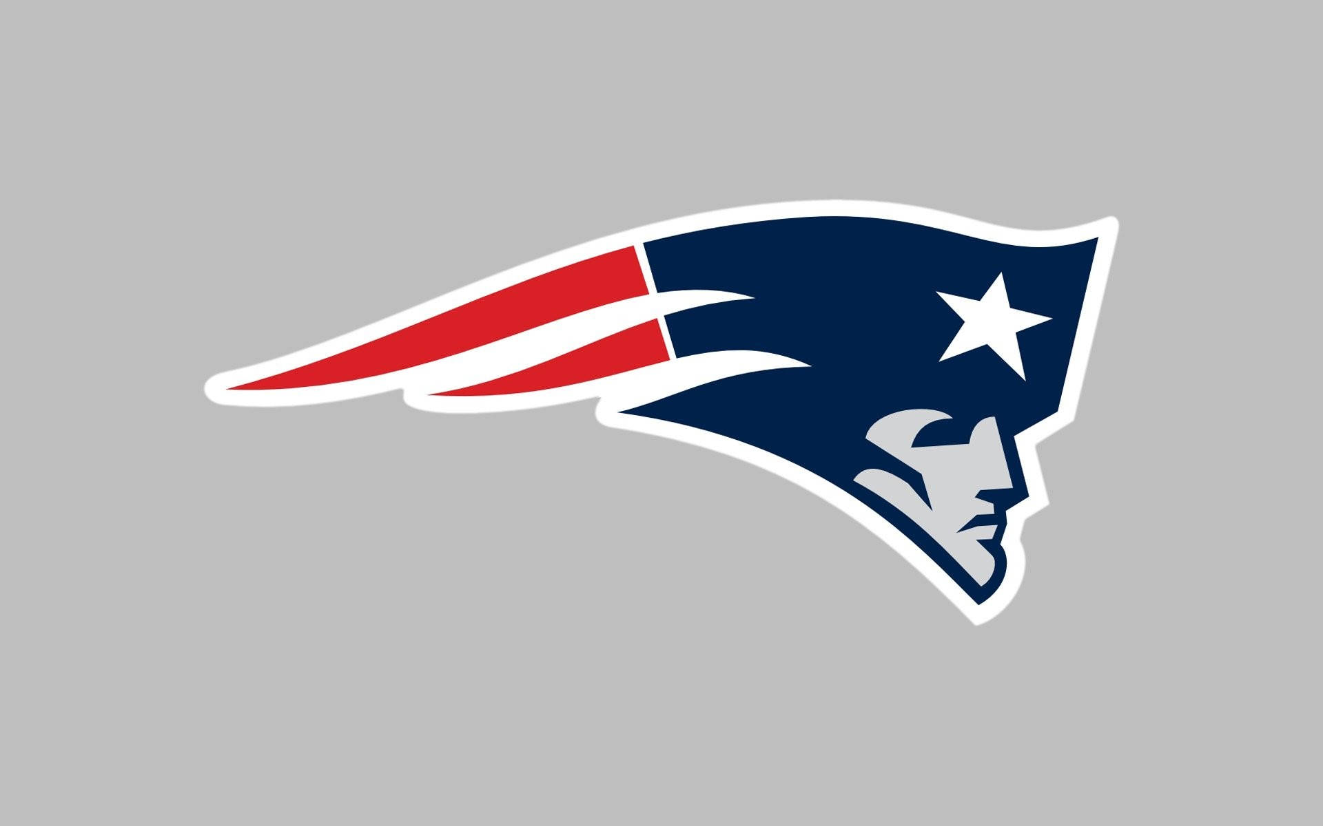 Patriots Logo 桌布 壁紙 — 新英格蘭愛國者隊標誌，藍色頭盔、白色星星、紅白條紋，灰色背景。