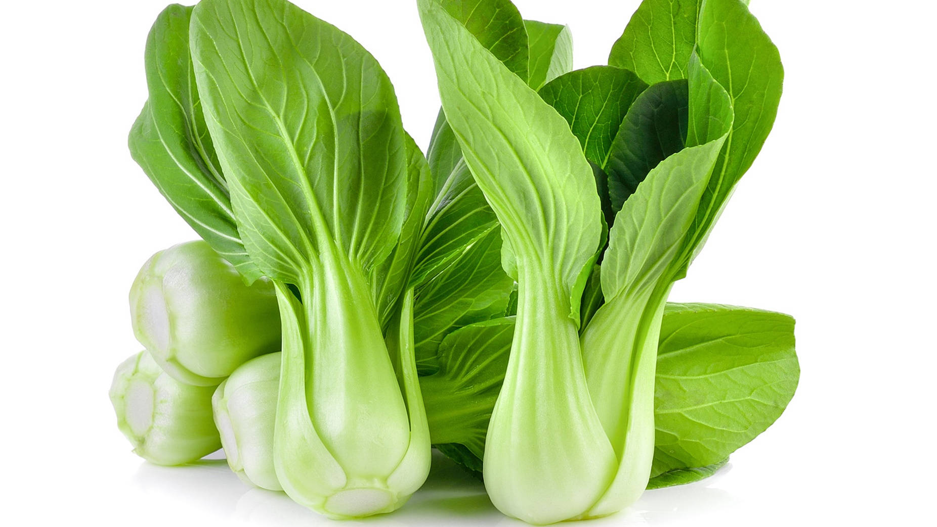 Vegetables 桌布 壁紙 — 新鮮脆嫩的小白菜，帶有鮮綠色的葉子和淡白色的莖，襯托在潔白的背景上。