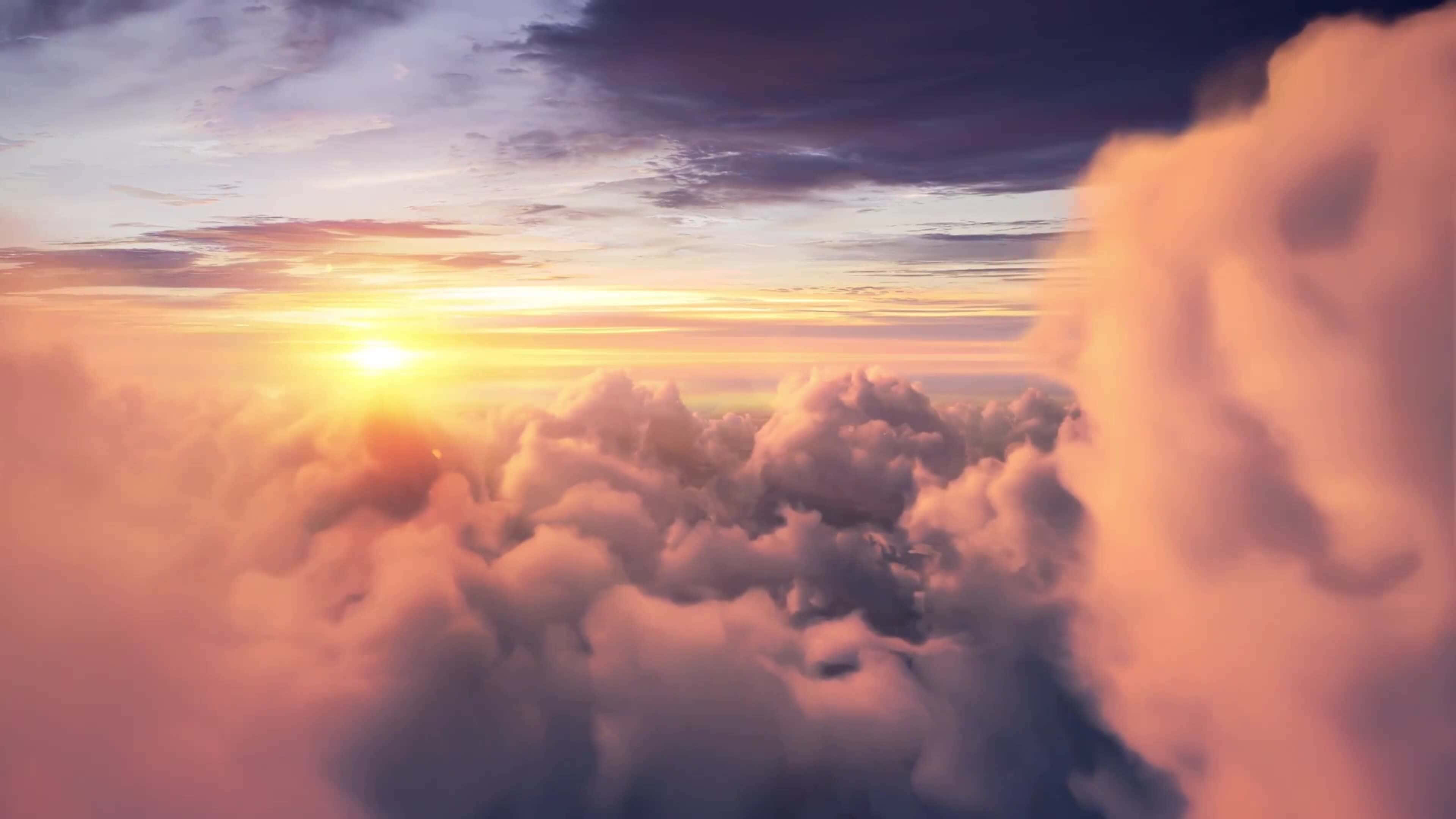 Clouds 4K 桌布 壁紙 — 日出溫暖地照耀在由柔和的粉紅色、紫色和金色繪成的蓬鬆雲海之上。