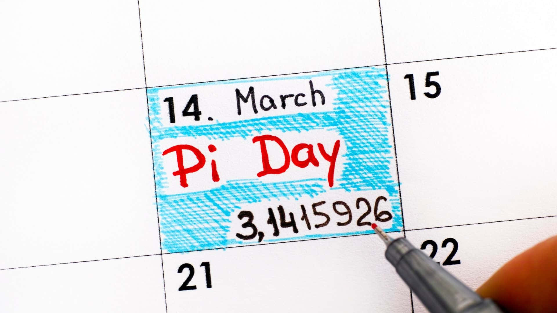 pi day 桌布 壁紙 — 日曆特寫，突出顯示3月14日，並用紅色墨水寫上「圓周率日」和數字3.1415926。
