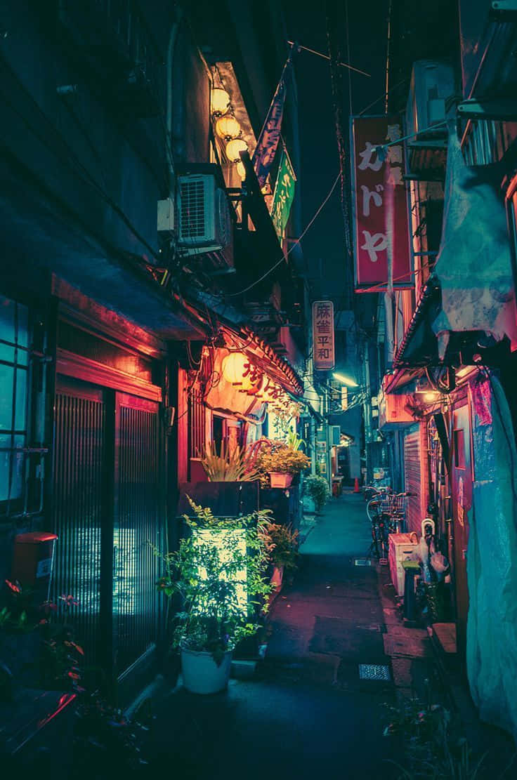 狹窄的日本小巷，夜晚閃爍著霓虹燈和懸掛的燈籠。 — 東京迷幻 sessions 壁紙