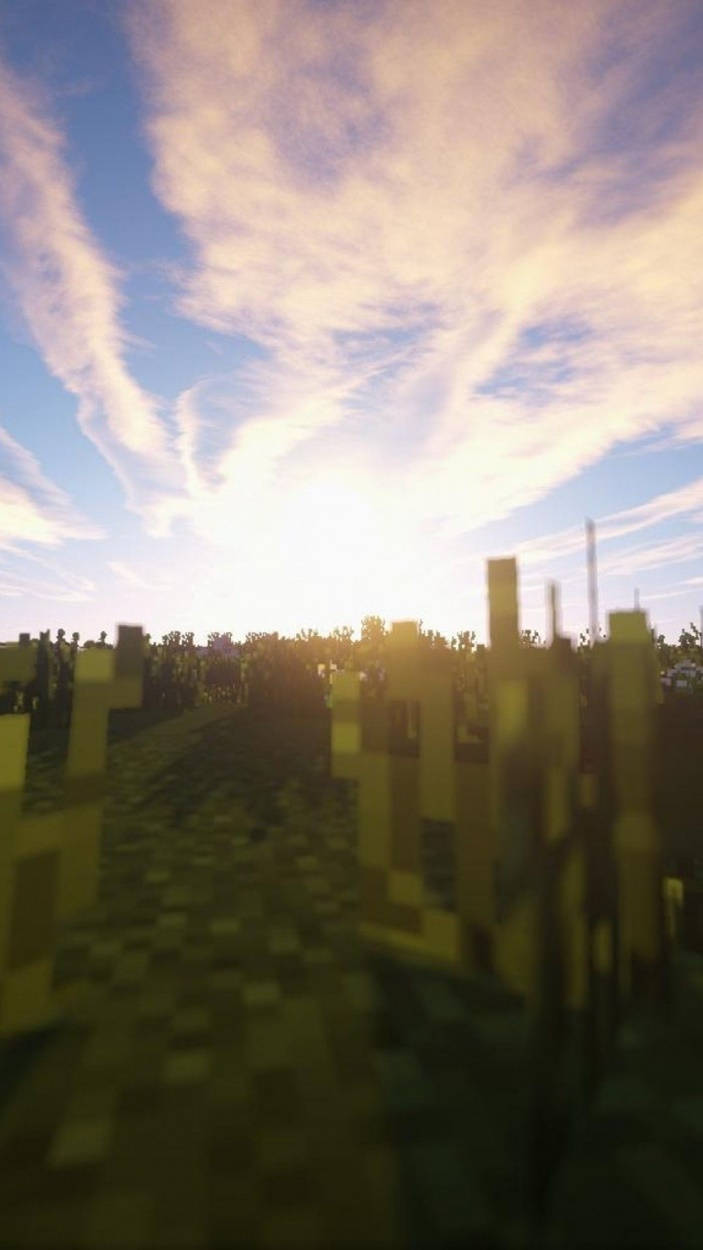 可愛 Minecraft 桌布 壁紙 — 日落於像素化Minecraft田野，發光天空與方塊樹木在前景。