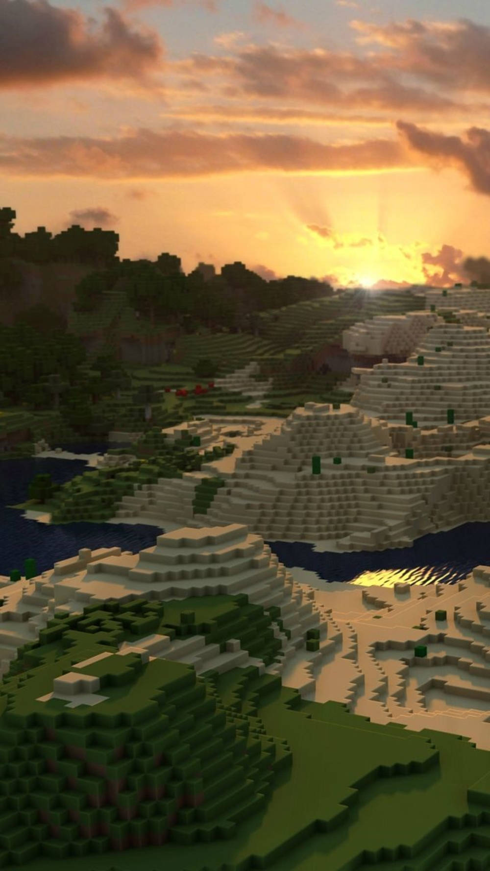 日落 桌布 壁紙 — 日落時分，一個方塊狀的Minecraft景觀，橙色雲層下是發光的水面和層疊的山丘。