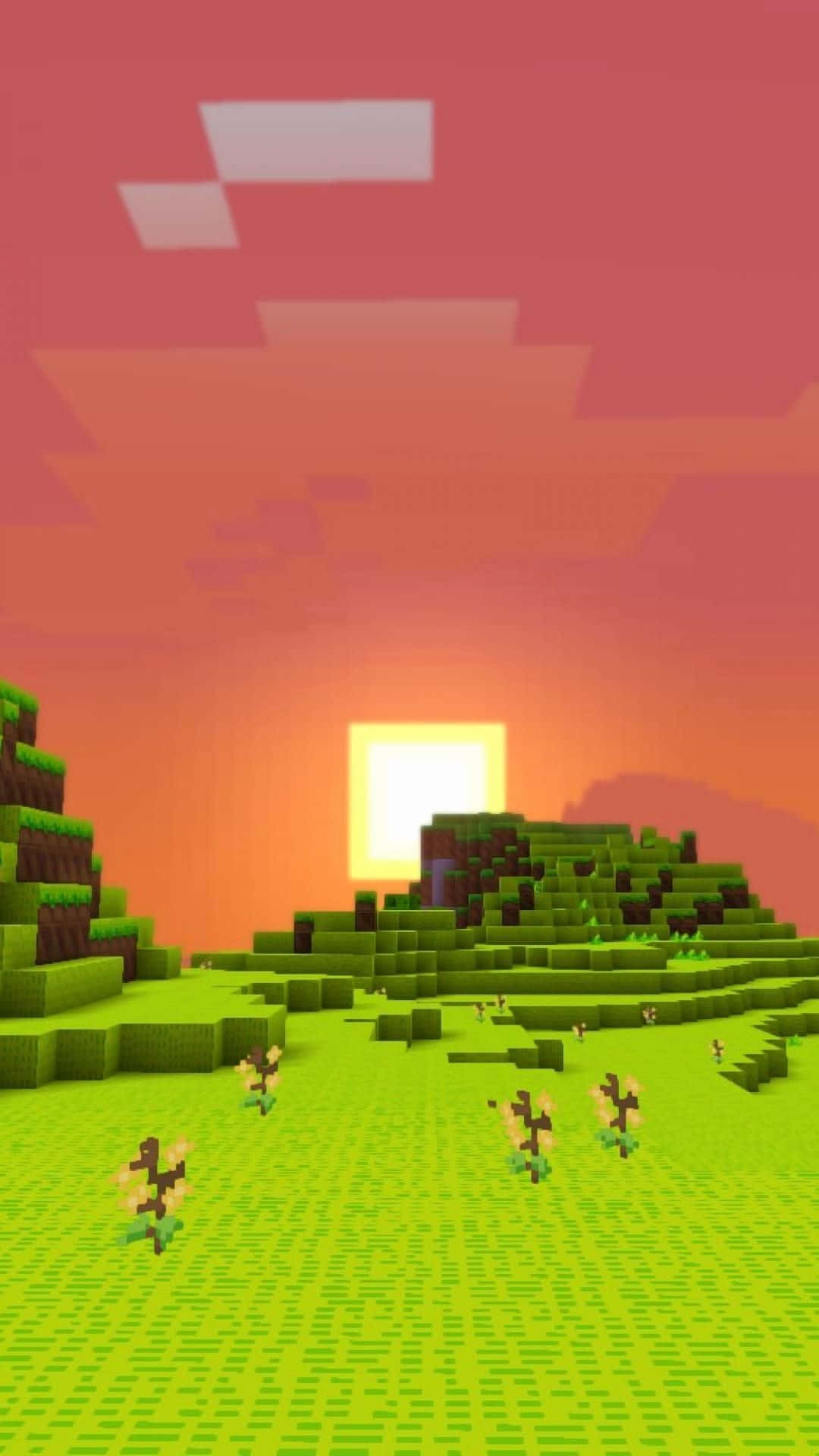 Minecraft Phone 桌布 壁紙 — 日落時分的像素化 Minecraft 景觀，有塊狀山丘、花朵和發光的太陽，背景是漸變天空。