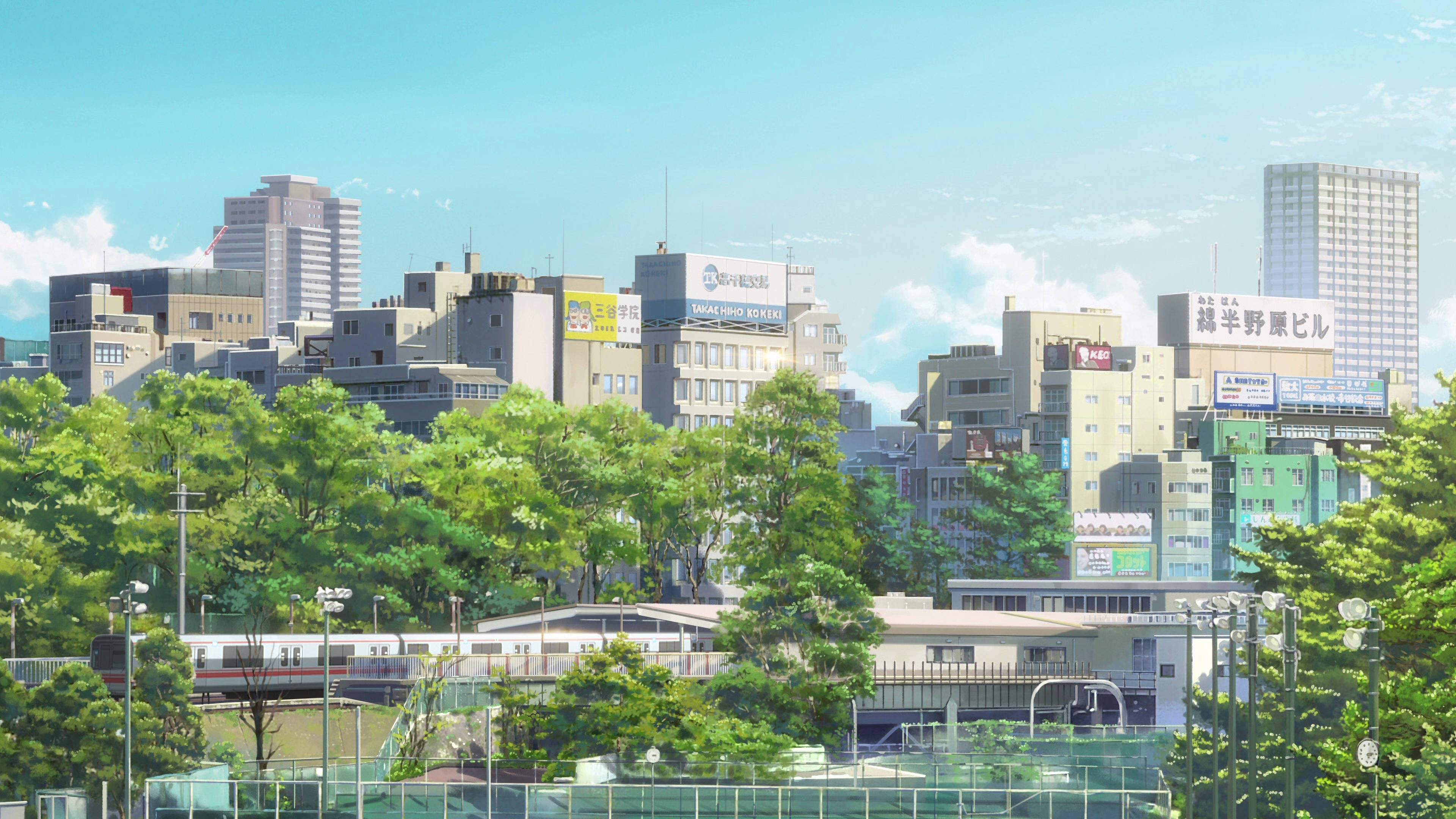 Your Name 桌布 壁紙 — 明亮的動畫城市景觀，茂密的綠樹襯托著現代建築，天空清澈湛藍。