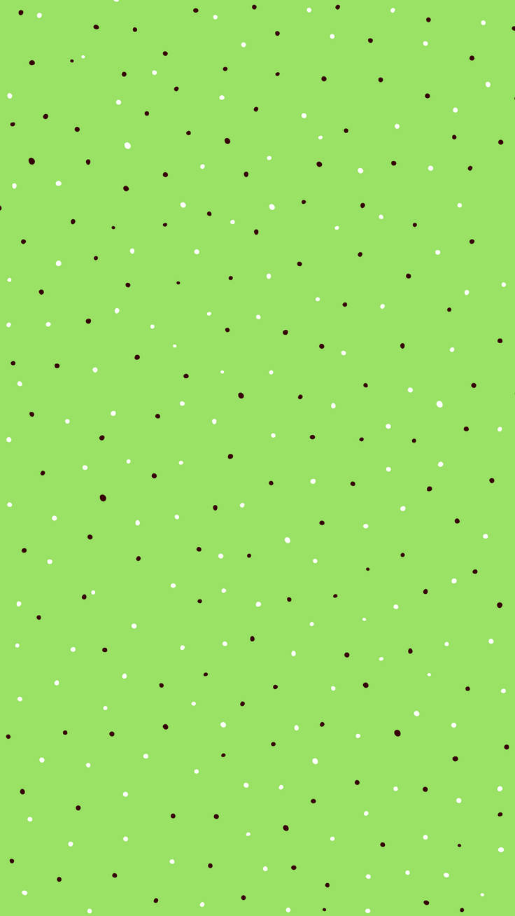 Dot 桌布 壁紙 — 明亮的萊姆綠色背景上散落著隨機的黑白圓點，營造出俏皮的抽象圖案。