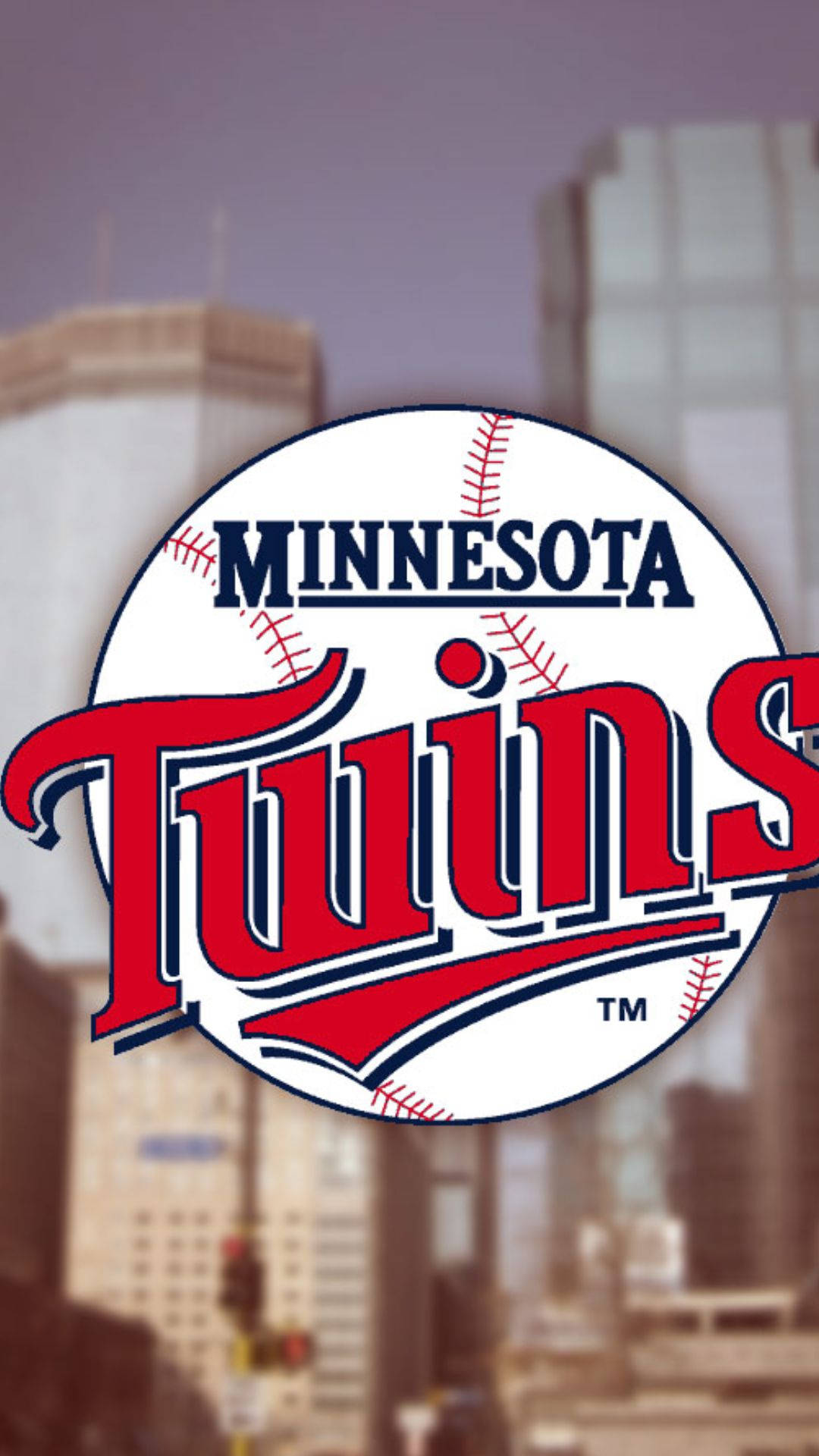 twins 桌布 壁紙 — 明尼蘇達雙城棒球隊標誌突出顯示在模糊的城市天際線和高樓大廈之上。
