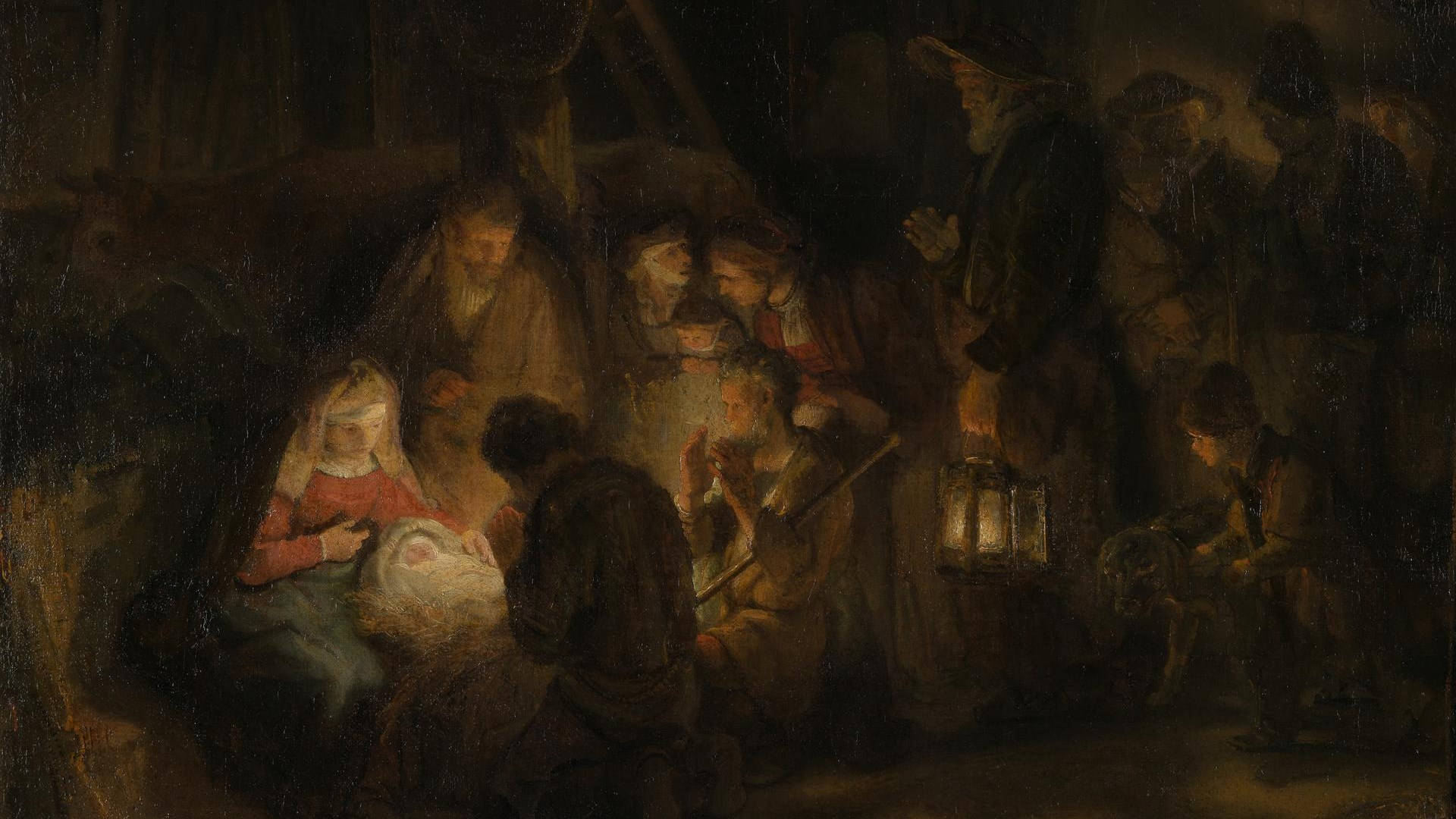 Rembrandt 桌布 壁紙 — 昏暗的聖經耶穌誕生場景，人物聚集在馬槽中發光的嬰兒周圍，被燈籠的溫暖光芒照亮。