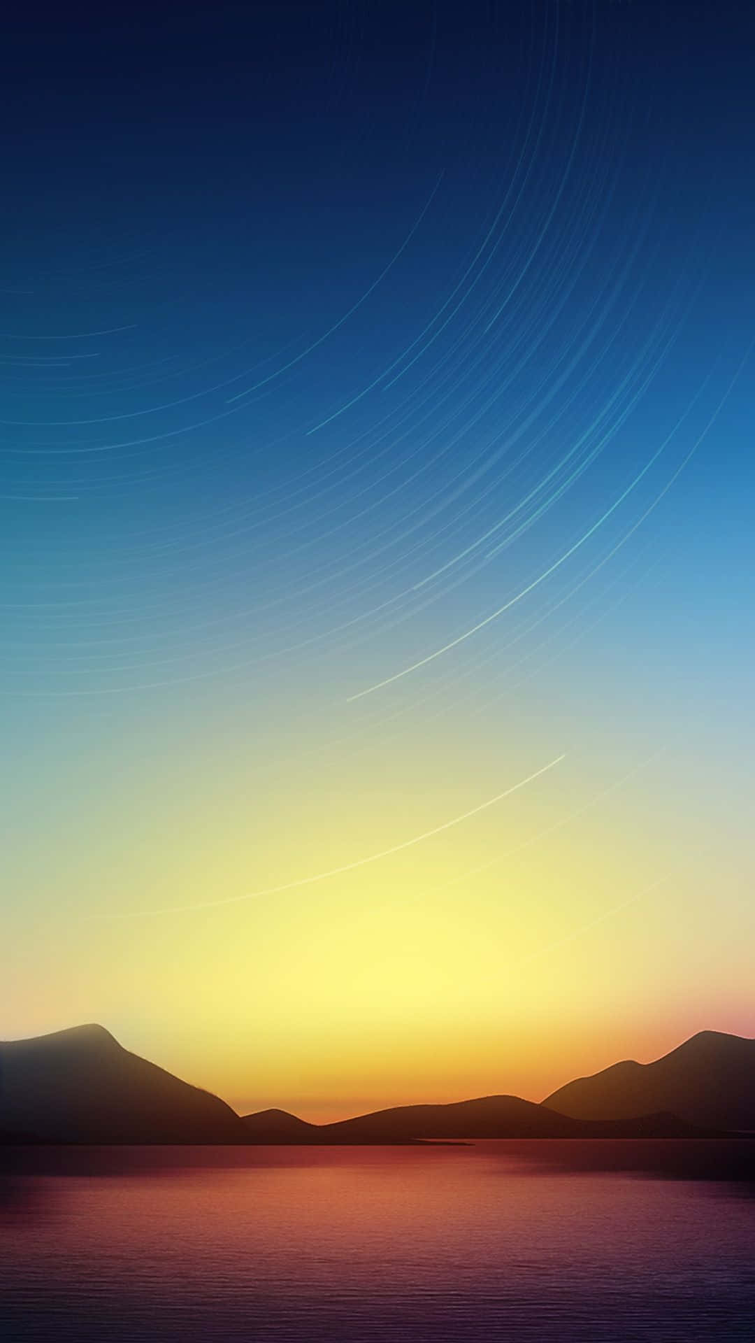 Vertical Monitor 桌布 壁紙 — 星軌在暮色天空中劃過弧線，下方是剪影般的山脈和倒映著金色色調的平靜水面。