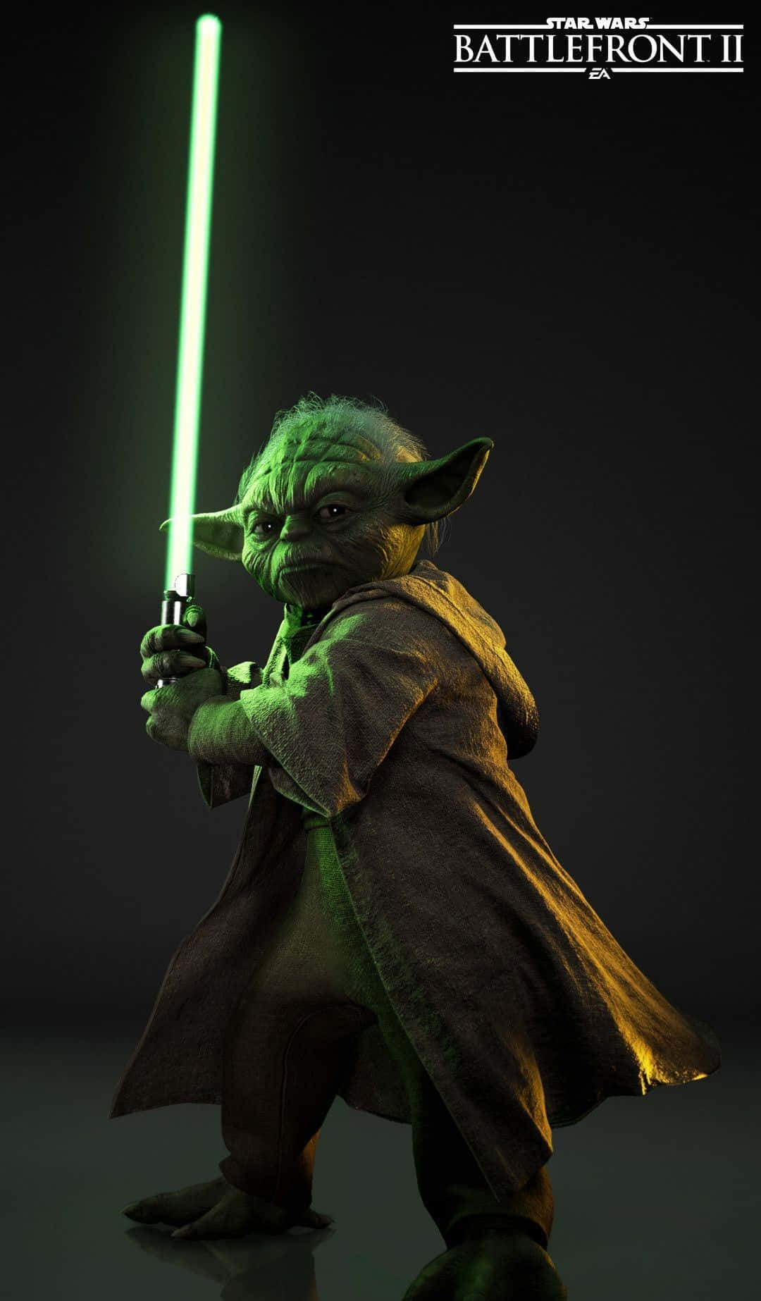 Yoda 桌布 壁紙 — 《星際大戰》中的尤達手持發光綠色光劍，在黑暗的攝影棚背景下擺出戰鬥姿勢。