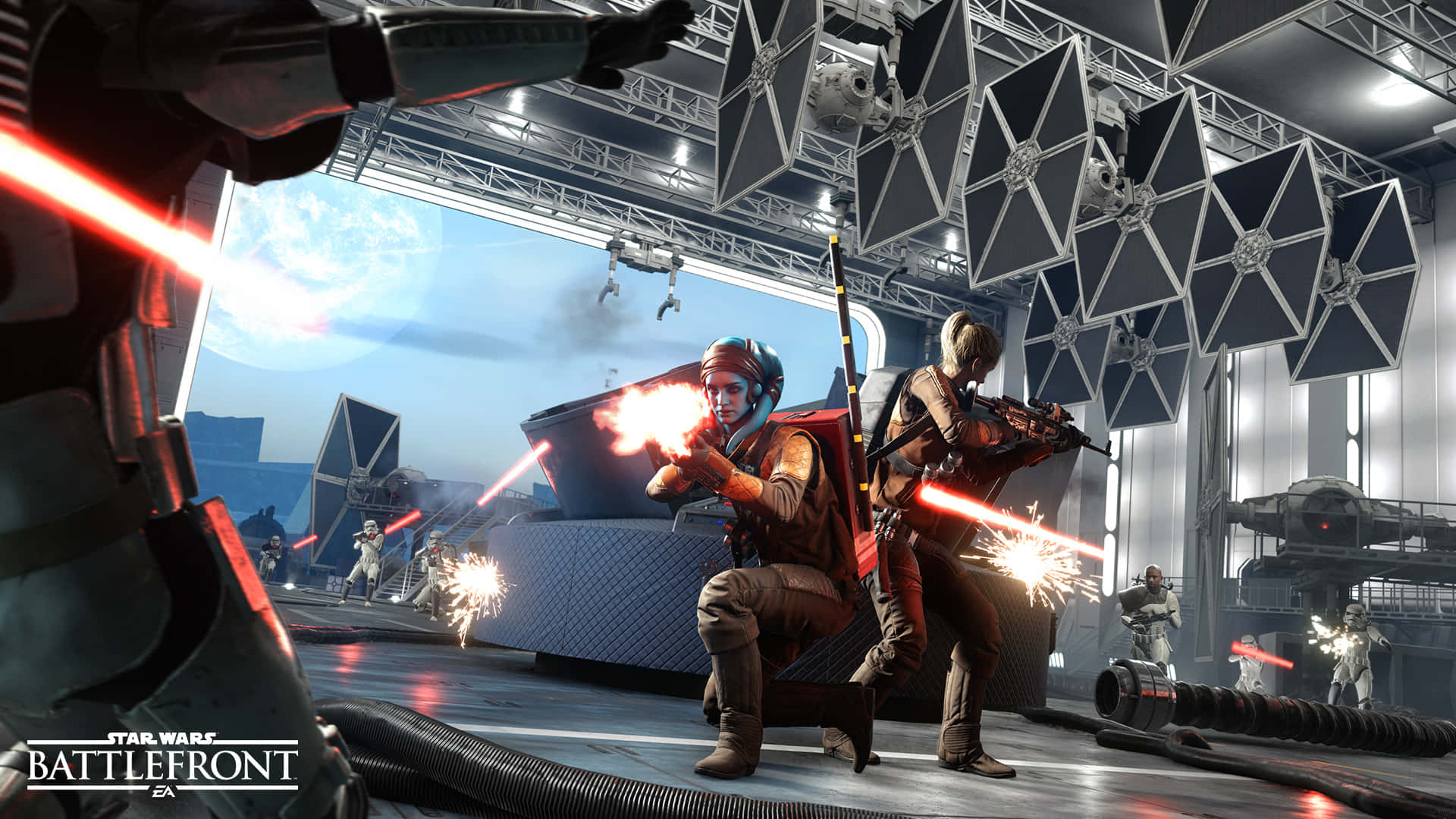 The Battle Of Jakku 桌布 壁紙 — 星際大戰叛軍在一個高科技機庫中發射爆能槍，頭頂懸掛著TIE戰鬥機。