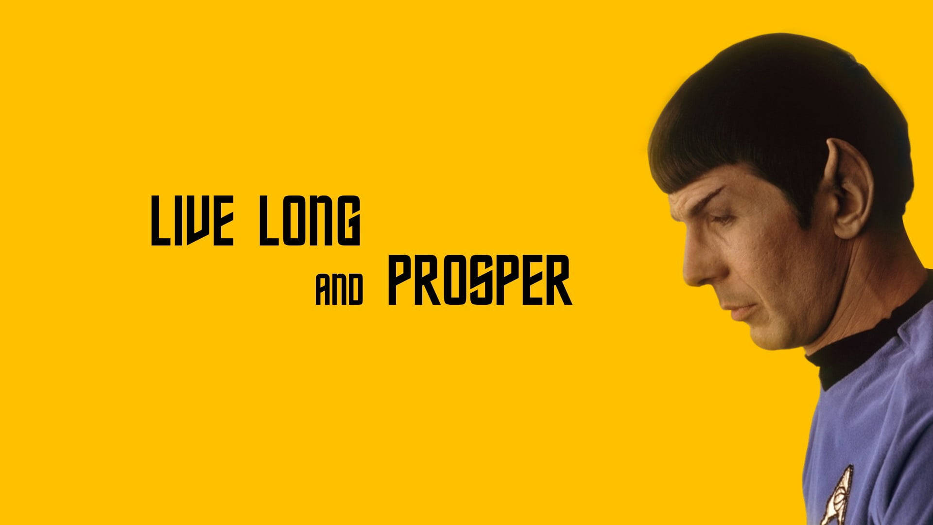 《星際爭霸戰》中的史巴克，黃色背景上寫有「Live Long and Prosper」文字。 — 星際爭霸戰 GIF 壁紙