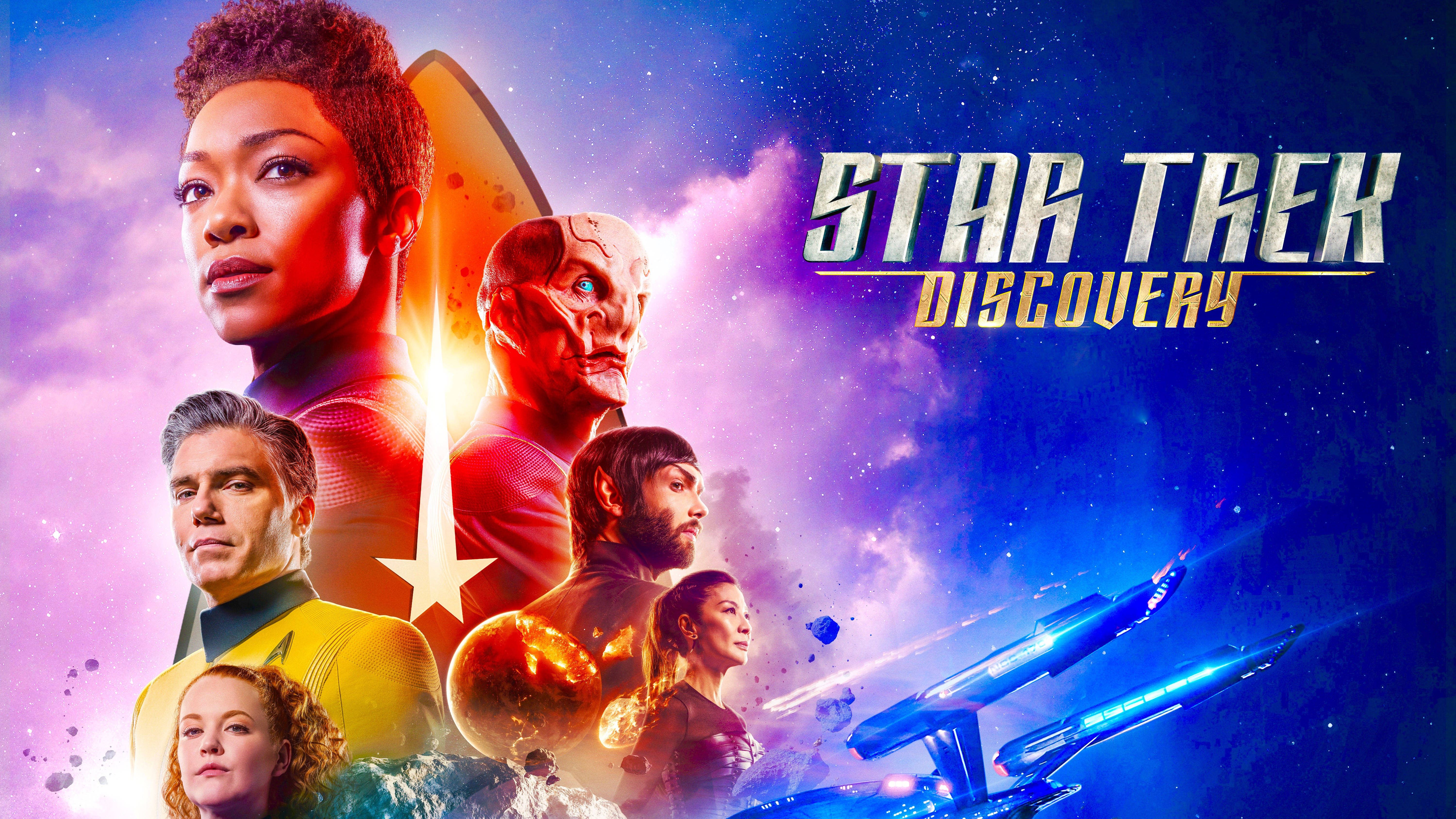 Discovery 桌布 壁紙 — 《星際爭霸戰：發現號》船員肖像在宇宙星雲背景下發光，一艘星艦在星域中翱翔。