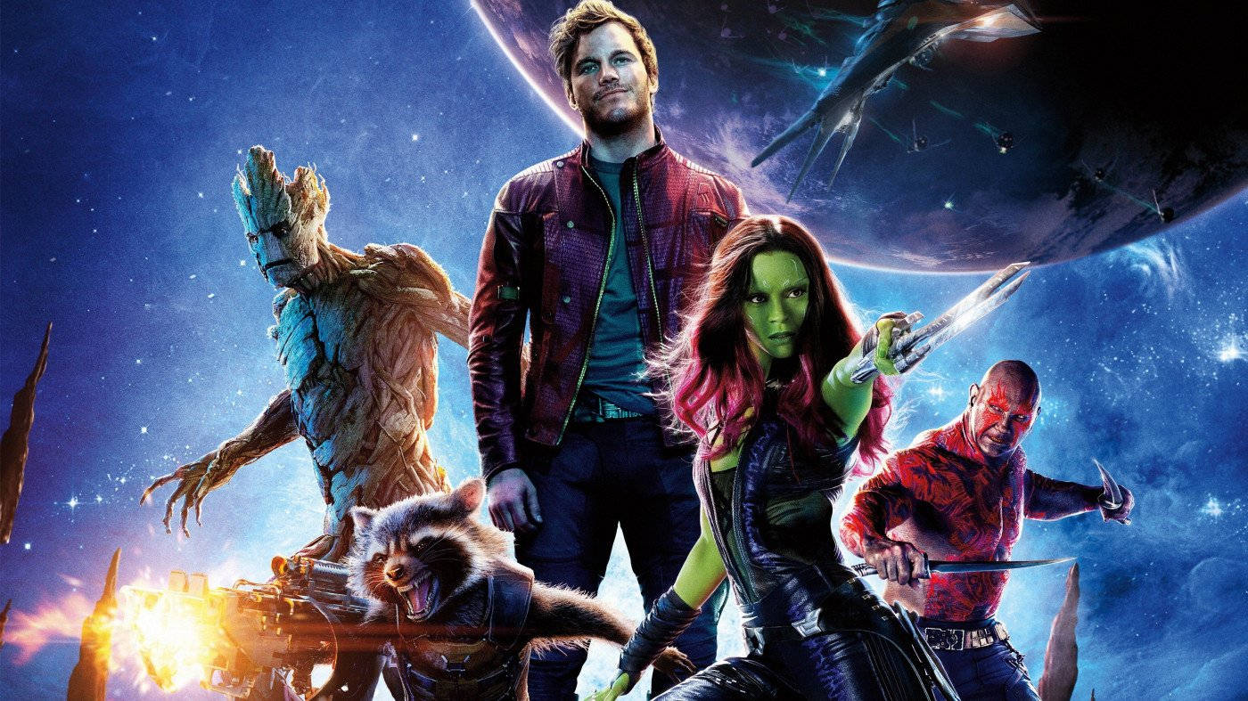 4K Guardians Of The Galaxy 桌布 壁紙 — 星際異攻隊團隊在佈滿星星、行星和太空船的宇宙背景下英勇地擺出姿勢。