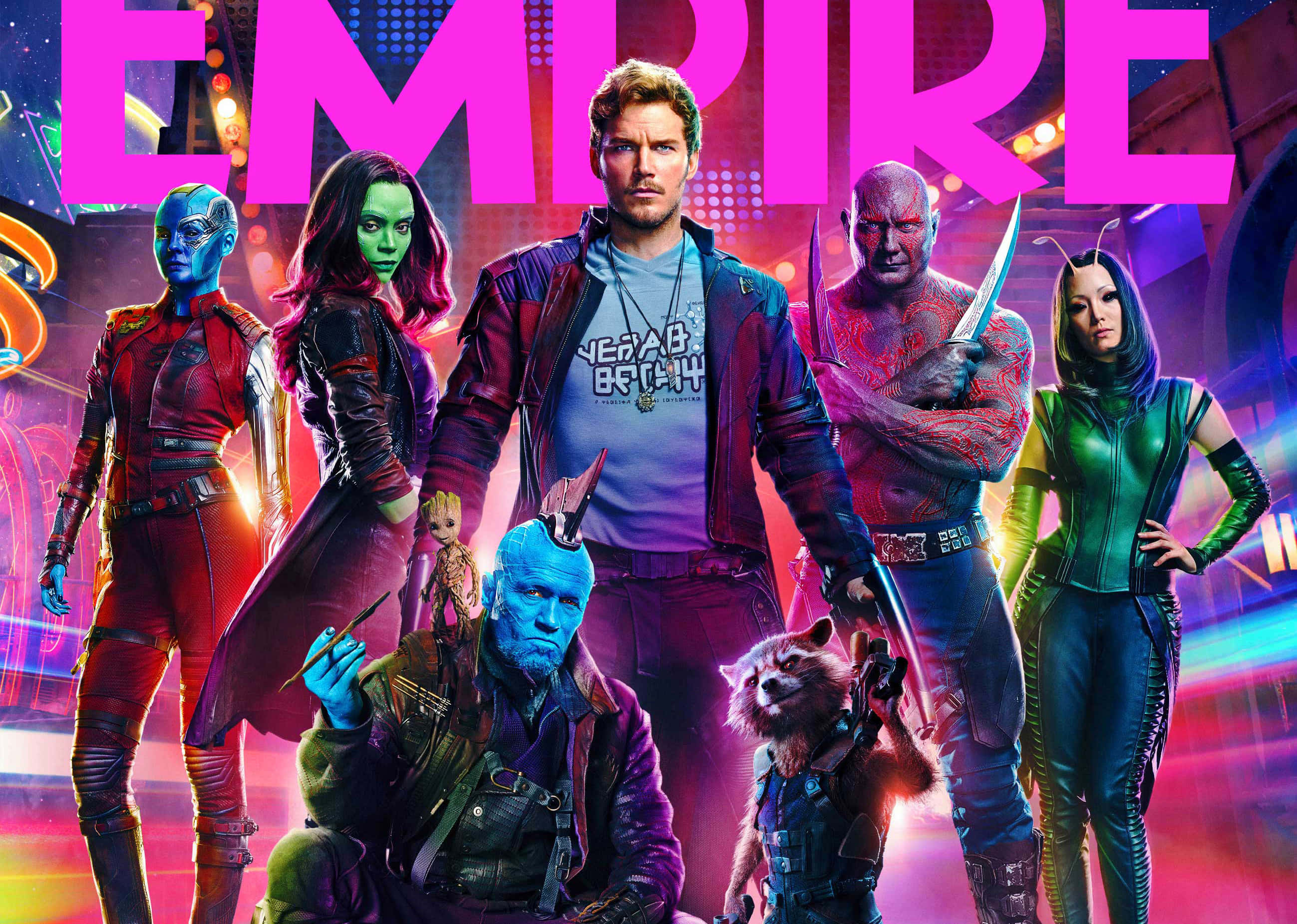 Guardians Of The Galaxy 2 桌布 壁紙 — 星際異攻隊團隊在霓虹燈照亮的宇宙背景下自信地擺姿勢，帶有粗體粉紅色「EMPIRE」文字。