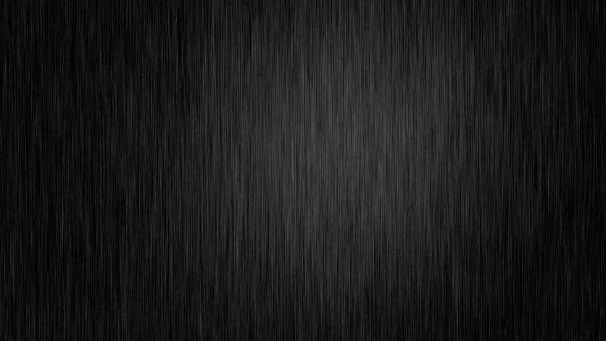 Black Gradient 桌布 壁紙 — 時尚深灰色拉絲金屬紋理，帶有細微垂直線條和柔和漸變照明。