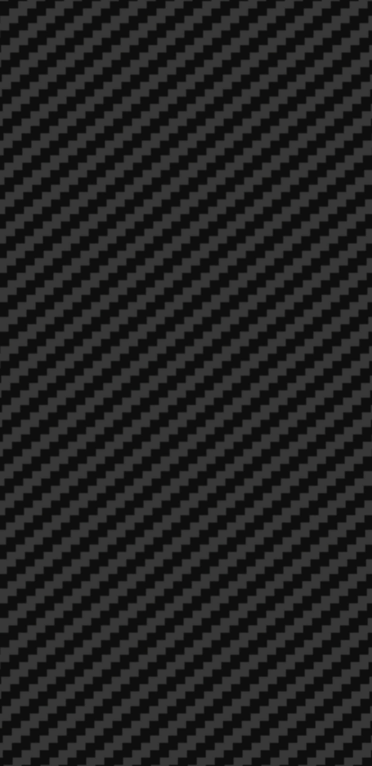 Black And Grey iPhone 桌布 壁紙 — 時尚的斜紋碳纖維紋理，帶有重複的深灰色和黑色編織圖案。