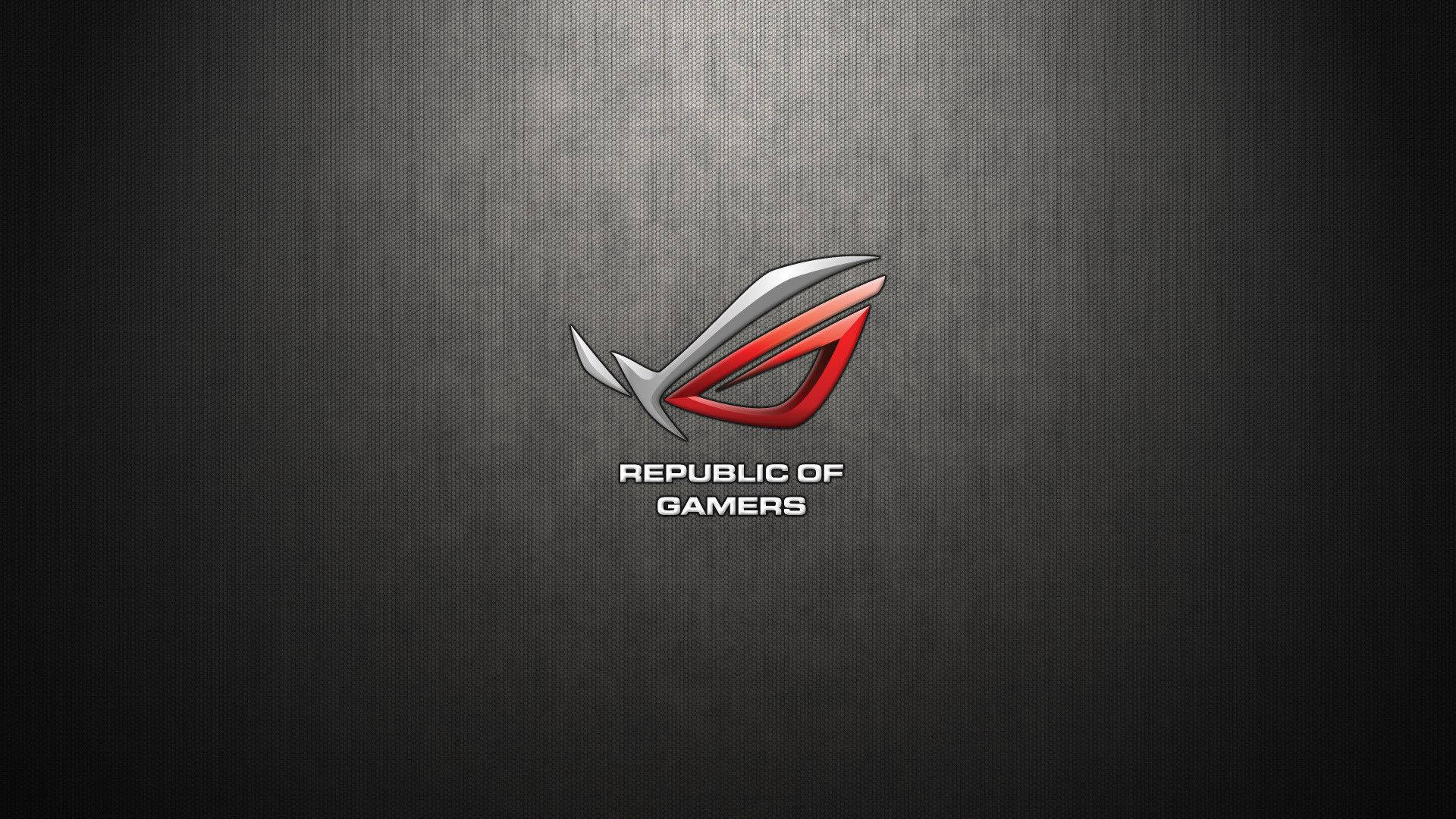 華碩 ROG 桌布 壁紙 — 時尚的紅色和銀色 ROG 標誌在帶有微妙照明的深色紋理金屬背景上發光。