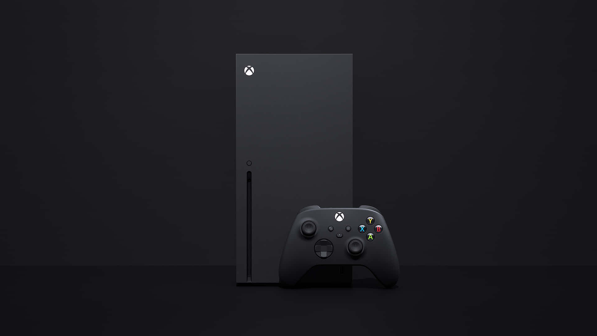 Xbox 桌布 壁紙 — 時尚的黑色 Xbox Series X 主機和控制器，在簡約的深色背景上，配以柔和燈光。
