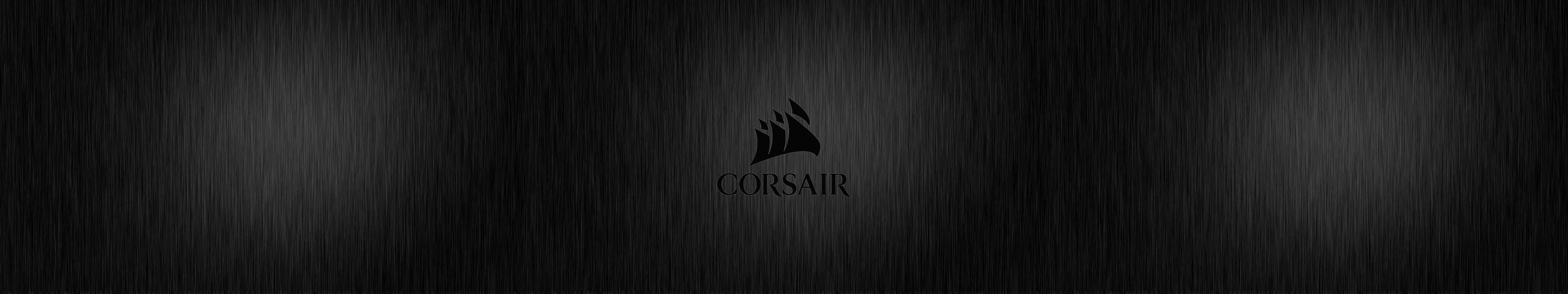海盜船 桌布 壁紙 — 時尚的黑色拉絲金屬背景，中央有低調的Corsair標誌，單色設計。