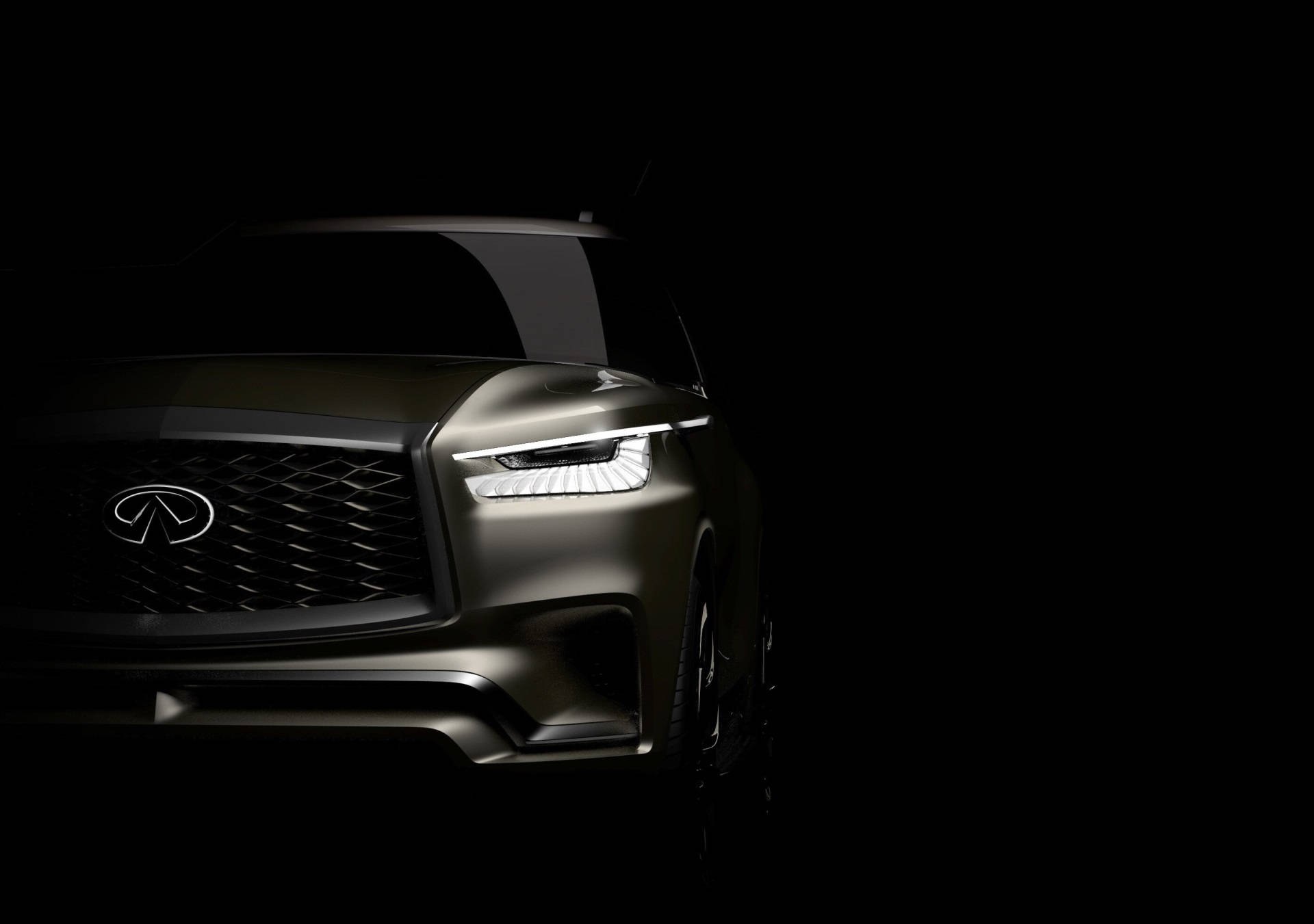 Infiniti 桌布 壁紙 — 時尚黑色SUV前臉，在黑色虛空中被發光頭燈照亮。