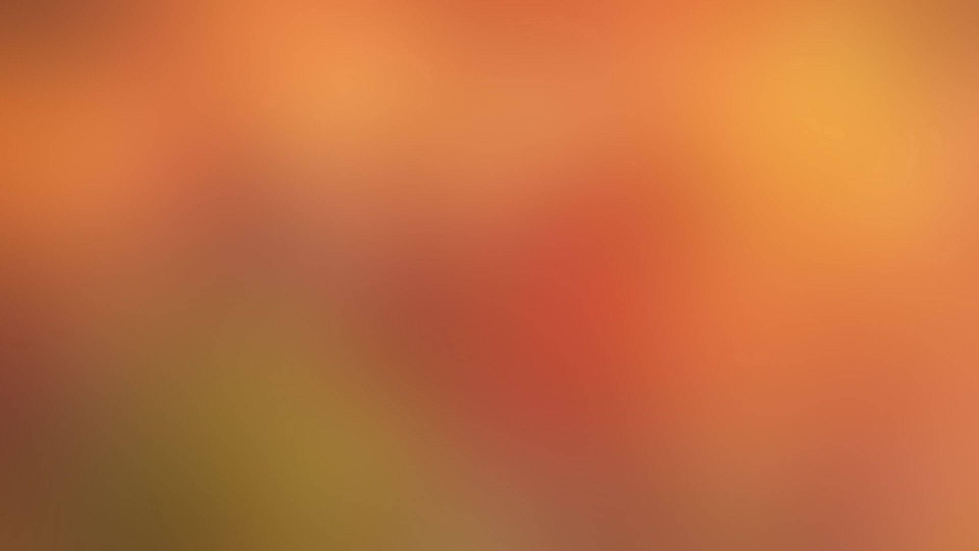 紅色動圖 桌布 壁紙 — 暖橙紅和黃色調的柔和漸變，在畫面中無縫融合。