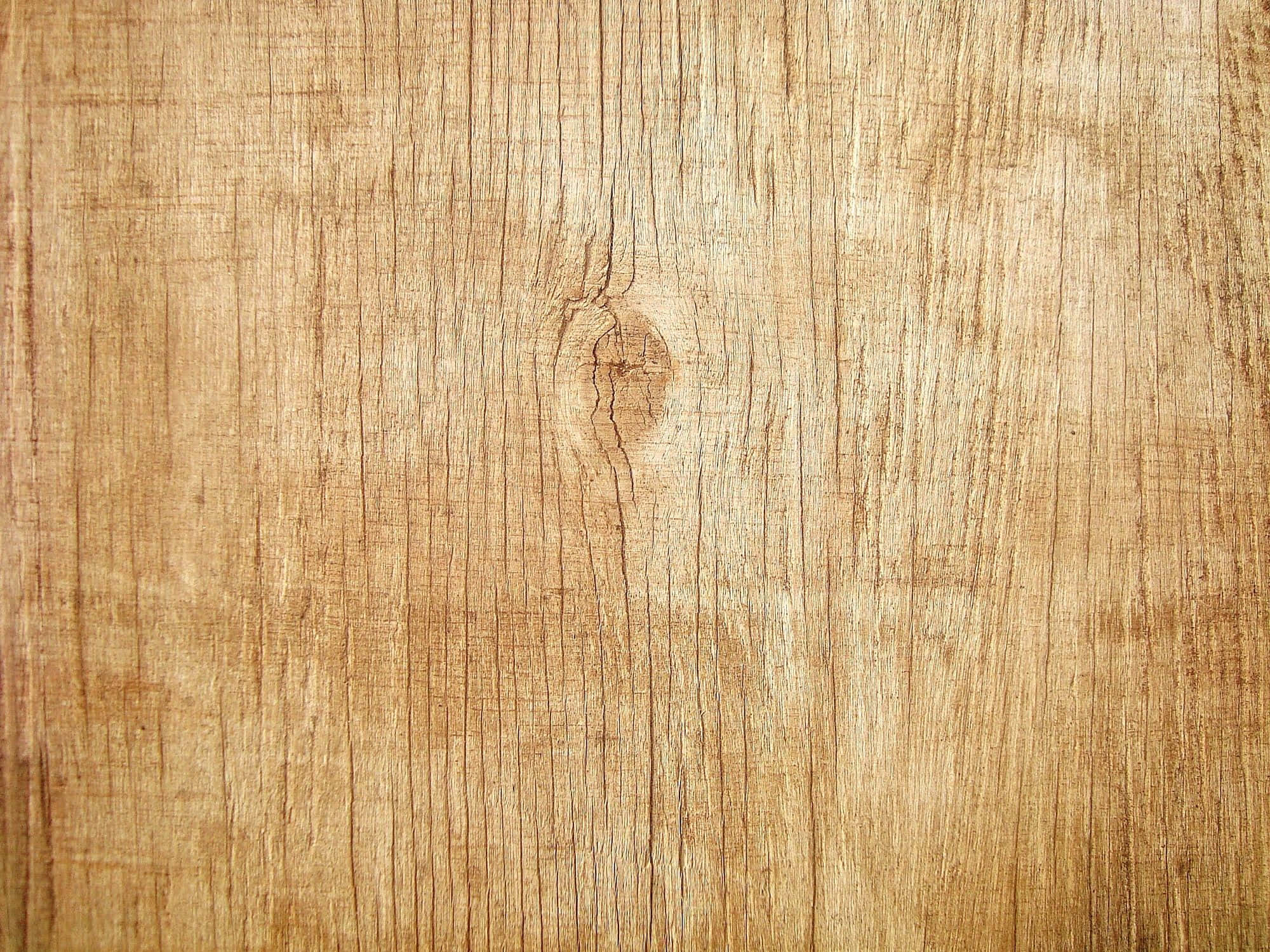 Wood Grain 桌布 壁紙 — 暖色調木紋特寫，中央有樹節，紋理自然。