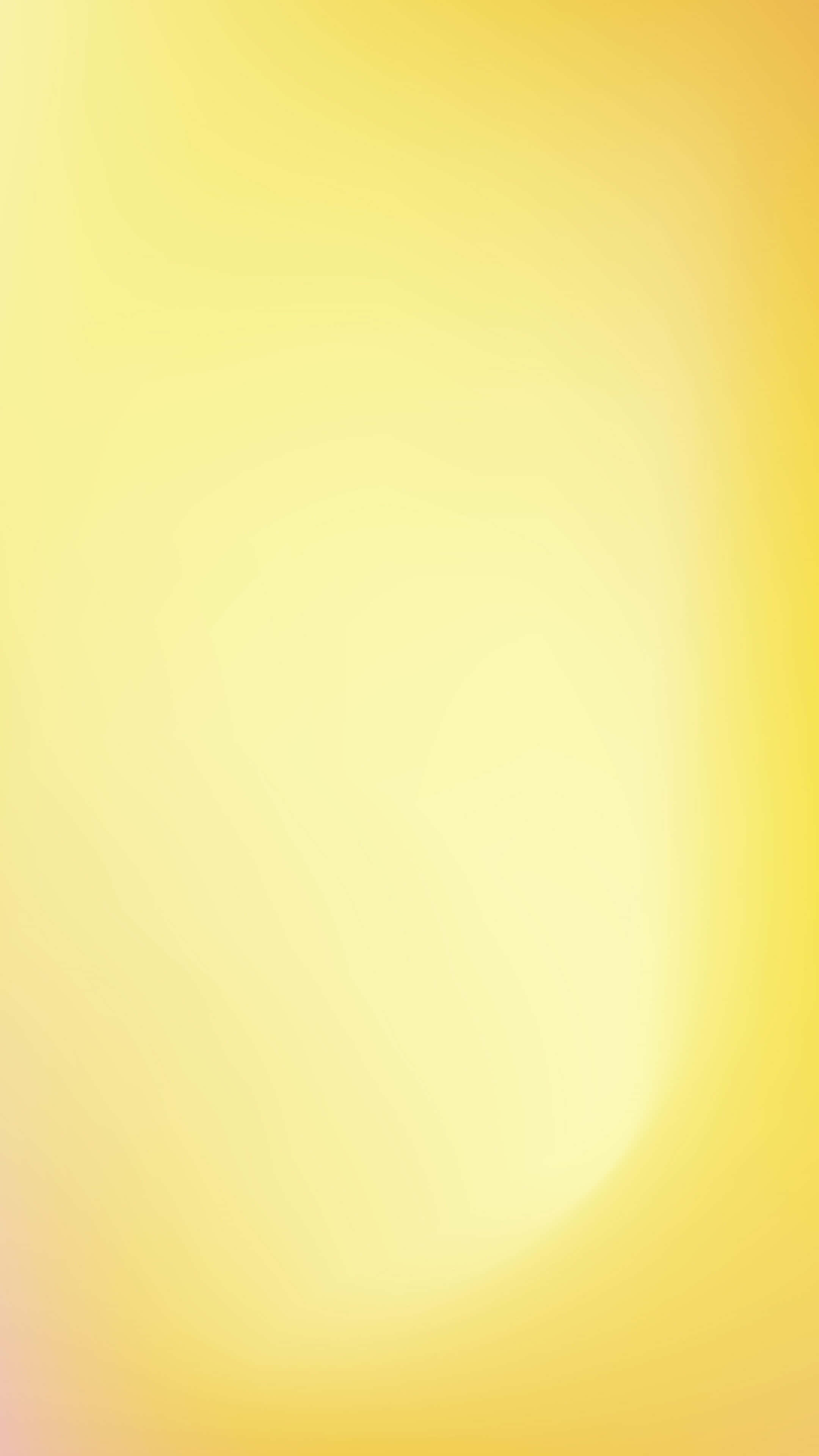 Yellow Gradient 桌布 壁紙 — 暖黃色與淡奶油色的柔和漸變，營造出溫柔發光的背景。