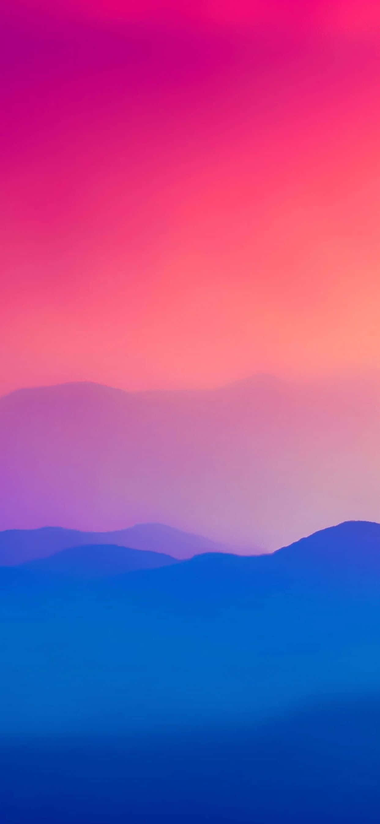 Minimalist Phone 桌布 壁紙 — 暮色中，層疊的山巒剪影之上，充滿活力的漸變天空從洋紅色過渡到藍色。