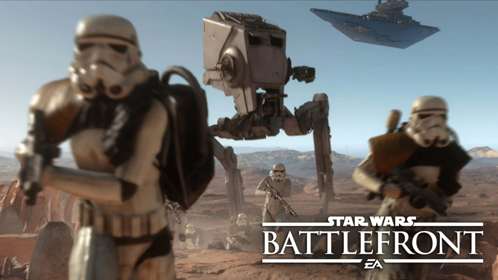 Jakku 桌布 壁紙 — 暴風兵和AT-ST步行者在晴朗的天空下穿越沙漠戰場，一艘星際毀滅者飛越頭頂。