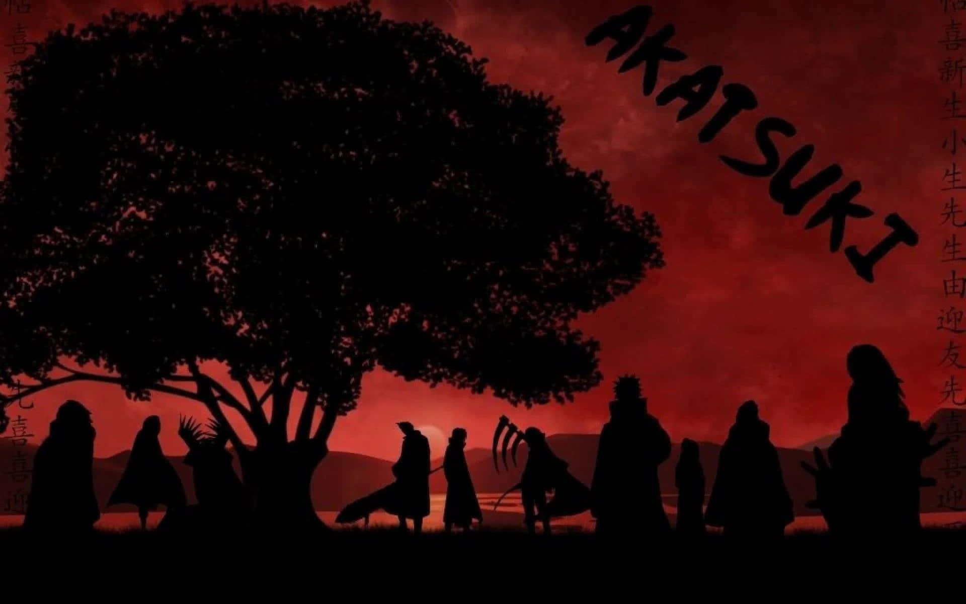 曉 桌布 壁紙 — 曉組織成員的剪影聚集在一棵大樹下，背景是血紅色的天空，並以粗體字寫上組織名稱。
