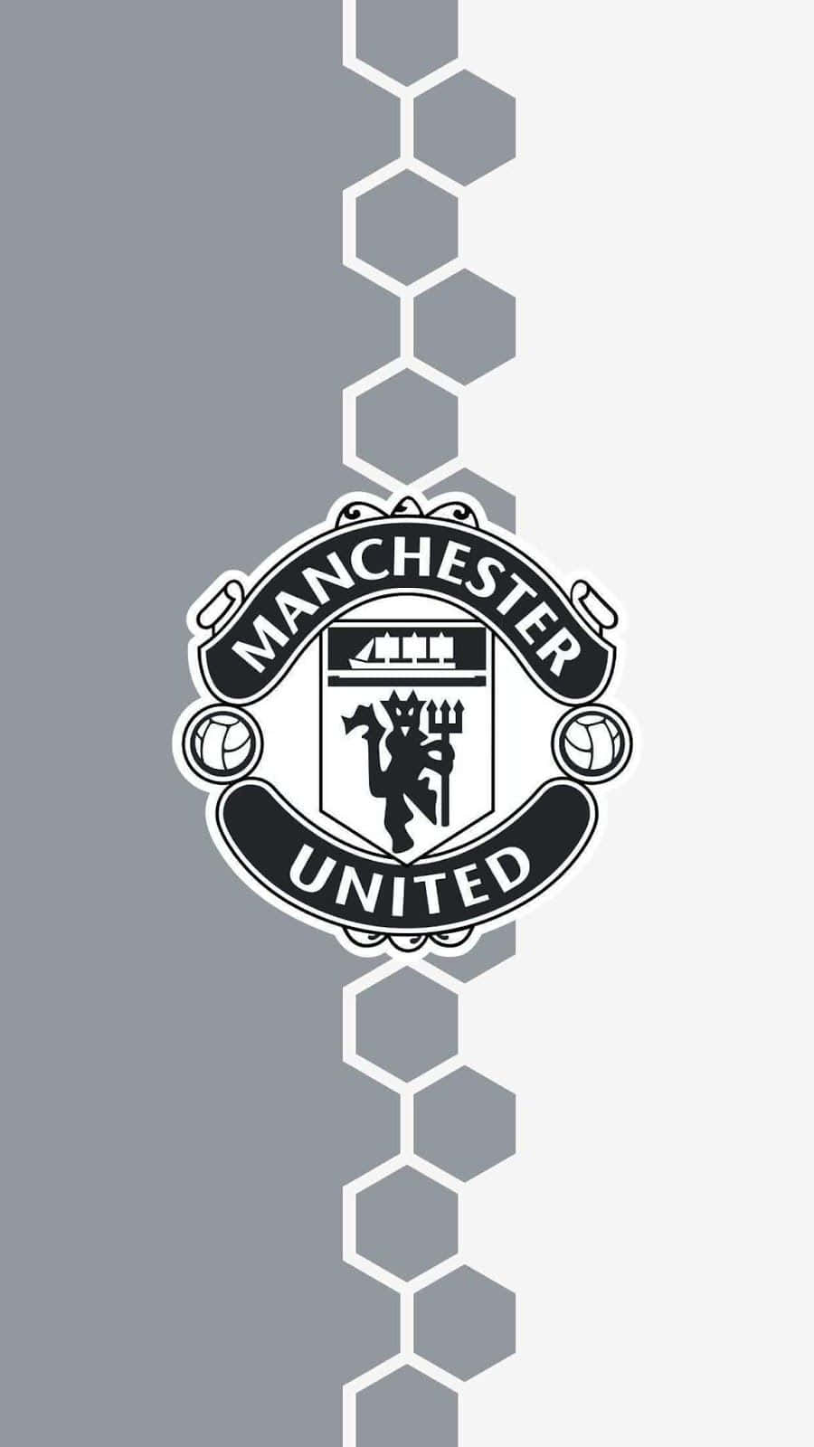 Manchester United Logo 桌布 壁紙 — 曼聯隊徽居中於灰色漸層背景，帶有白色六邊形圖案邊框。