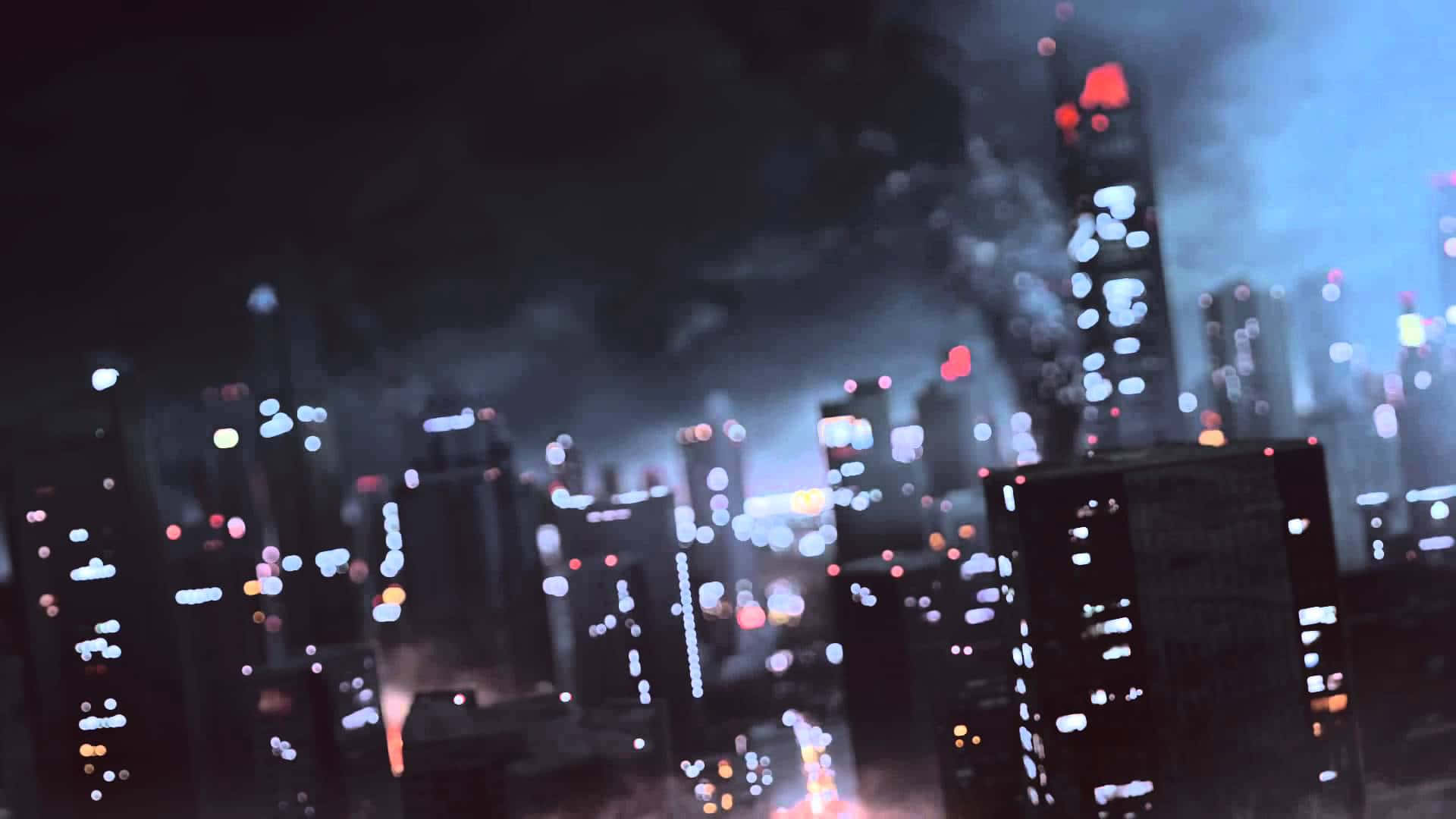 Ambience 桌布 壁紙 — 朦朧的夜景，摩天大樓的模糊燈光，以及燃燒中的塔樓升起的煙霧。
