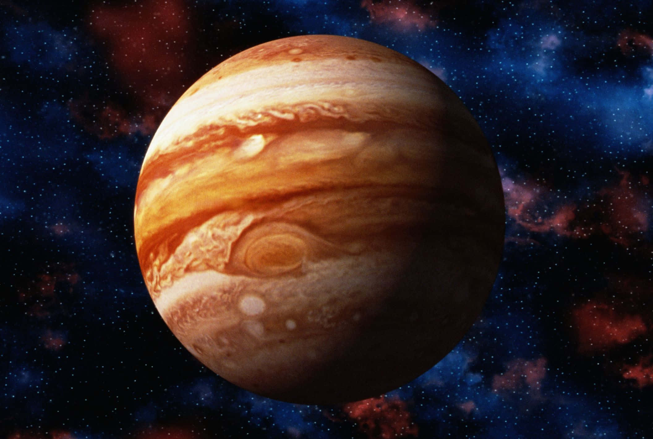 木星 桌布 壁紙 — 木星以旋轉的橙色和白色條紋主導宇宙場景，背景是佈滿星星的星雲。