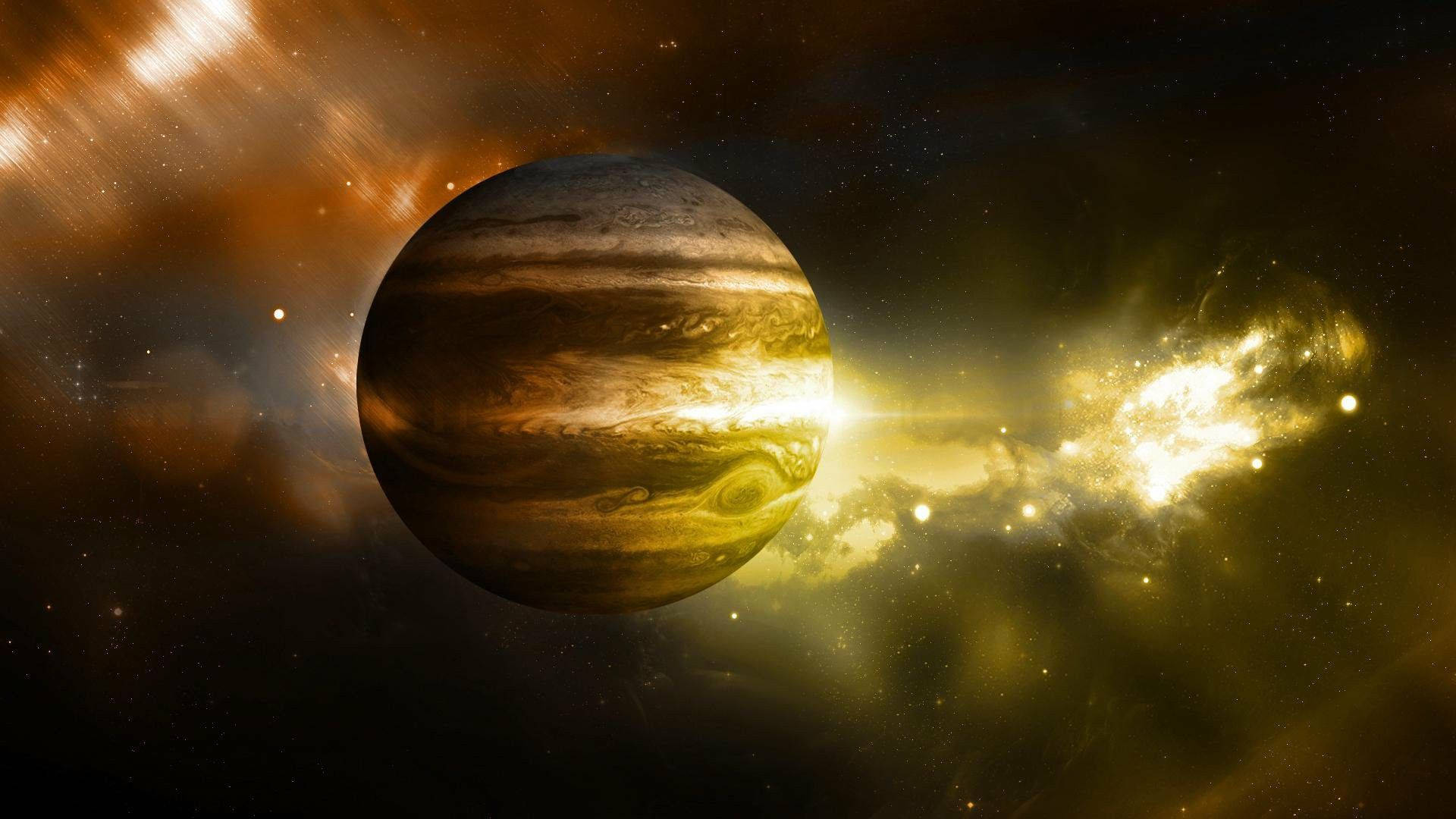 木星 桌布 壁紙 — 木星在旋轉星雲和星場的背景下發出金色光芒的宇宙場景。