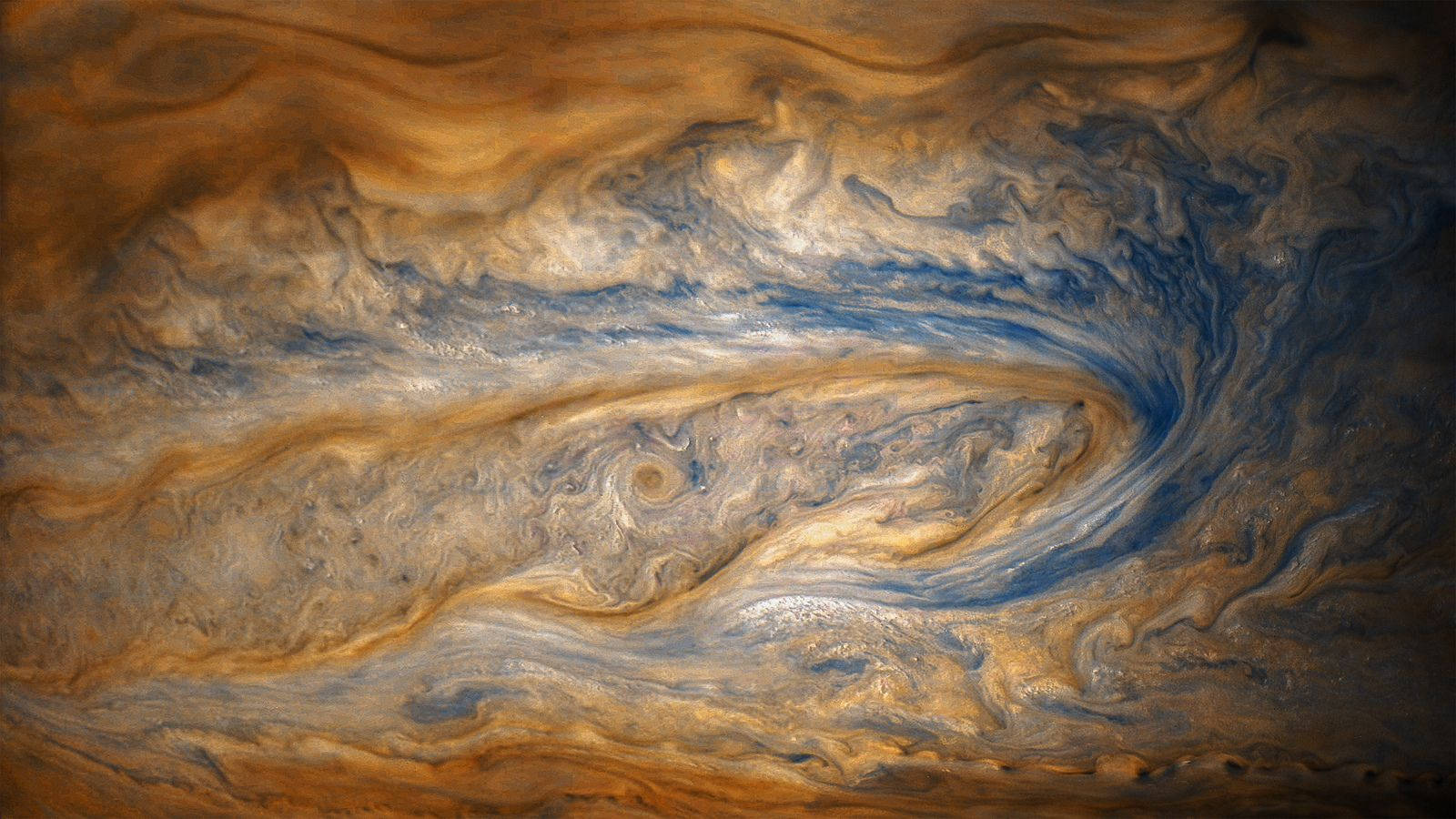 木星 桌布 壁紙 — 木星湍流大氣中橙色、棕色和藍色雲層的漩渦掛毯。