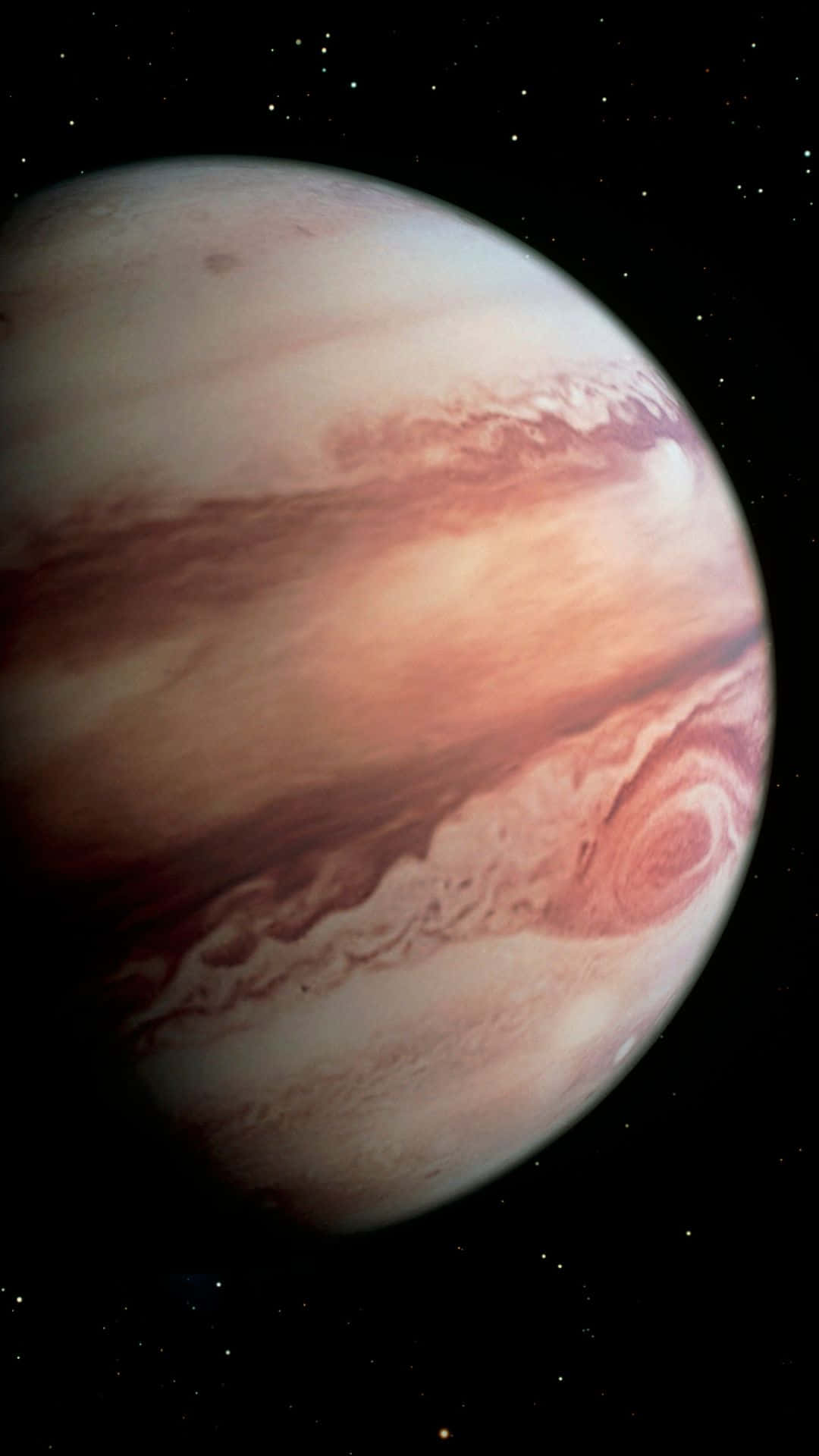 行星動畫 桌布 壁紙 — 木星的壯麗景觀，在繁星點點的黑色天空中，有旋轉的紅色和白色雲層。