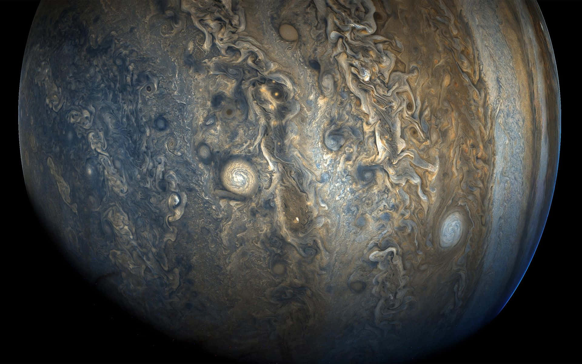 木星的湍流大氣，帶有漩渦風暴和雲帶。 — 1920x1200 GIF 壁紙