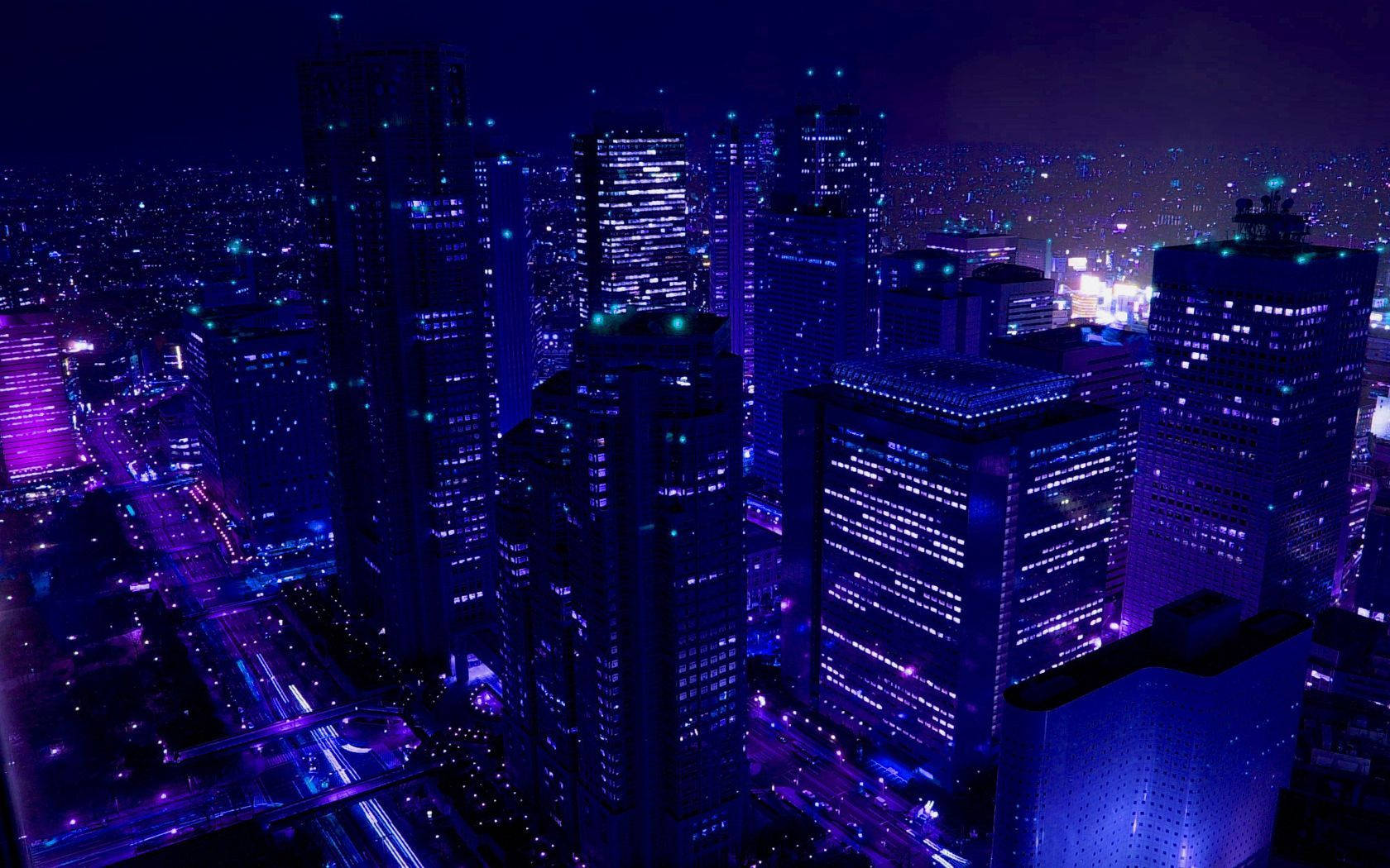 夜空 桌布 壁紙 — 未來城市夜晚的鳥瞰圖，沐浴在摩天大樓和發光街道的電藍色和紫色霓虹燈中。