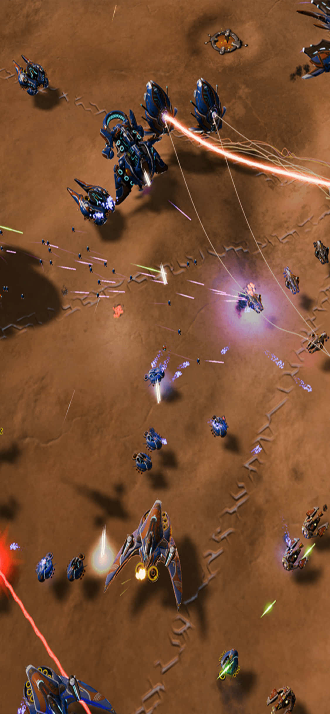 iPhone X Ashes Of The Singularity 桌布 壁紙 — 未來太空船在沙漠星球上戰鬥，伴隨著發光的雷射火和爆炸。