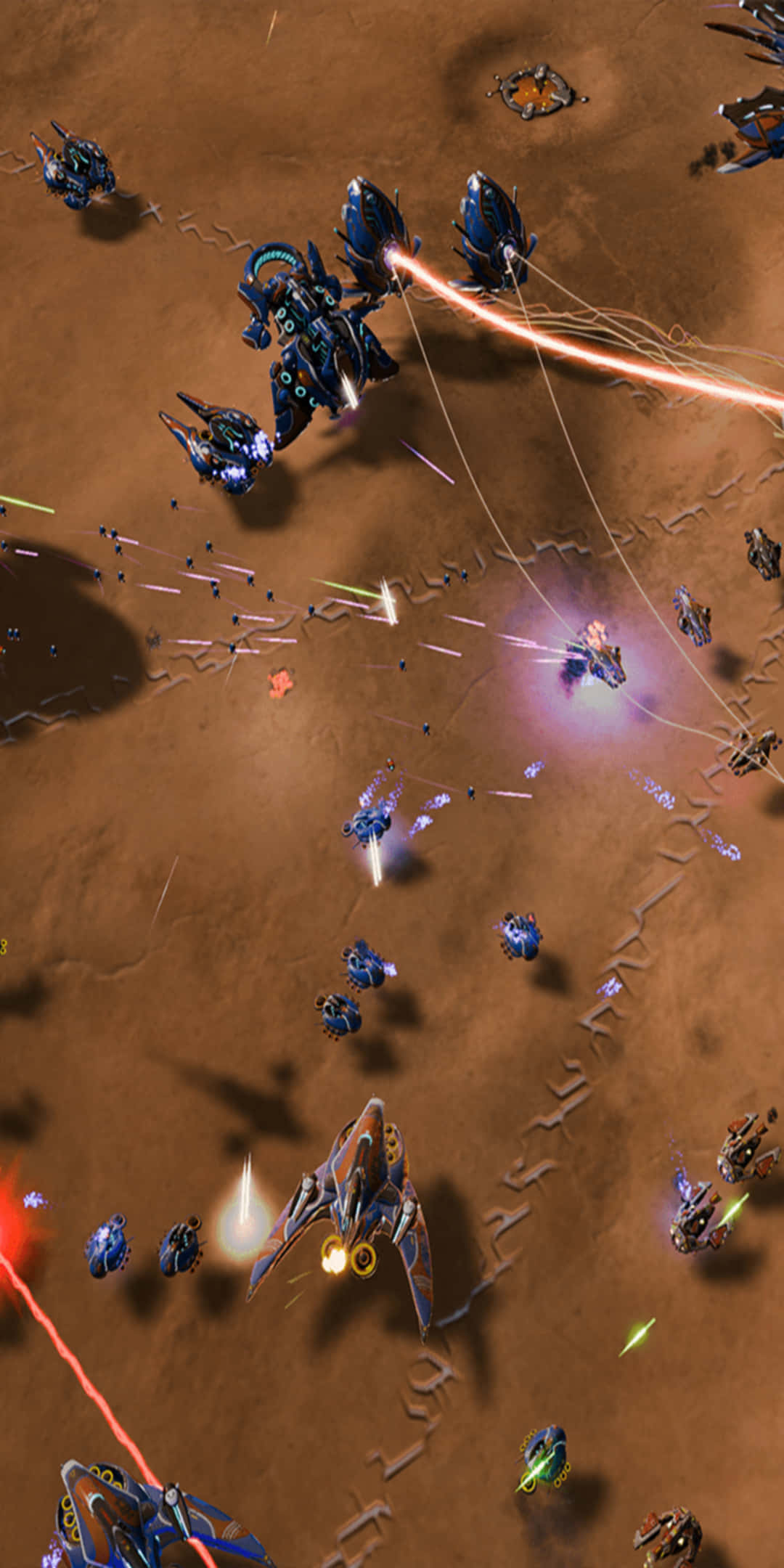Pixel 3 Ashes Of The Singularity 桌布 壁紙 — 未來太空船在貧瘠的沙漠星球上戰鬥，雷射火力和爆炸照亮了塵土飛揚的地形。