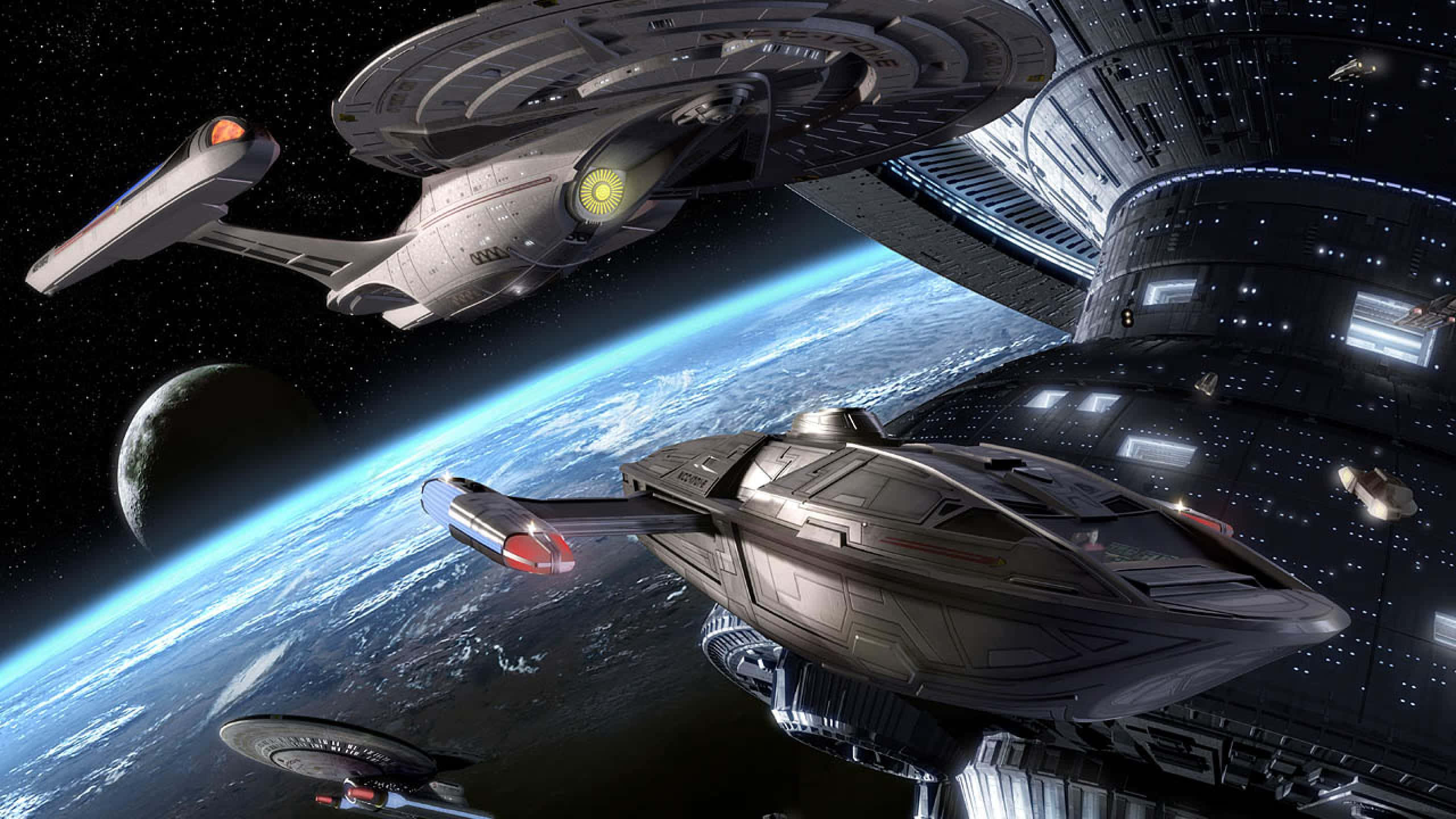 Star Trek Enterprise 桌布 壁紙 — 未來星際飛船環繞著一顆充滿活力的藍色行星運行，行星上有發光的城市燈光，背景是繁星點點的宇宙。