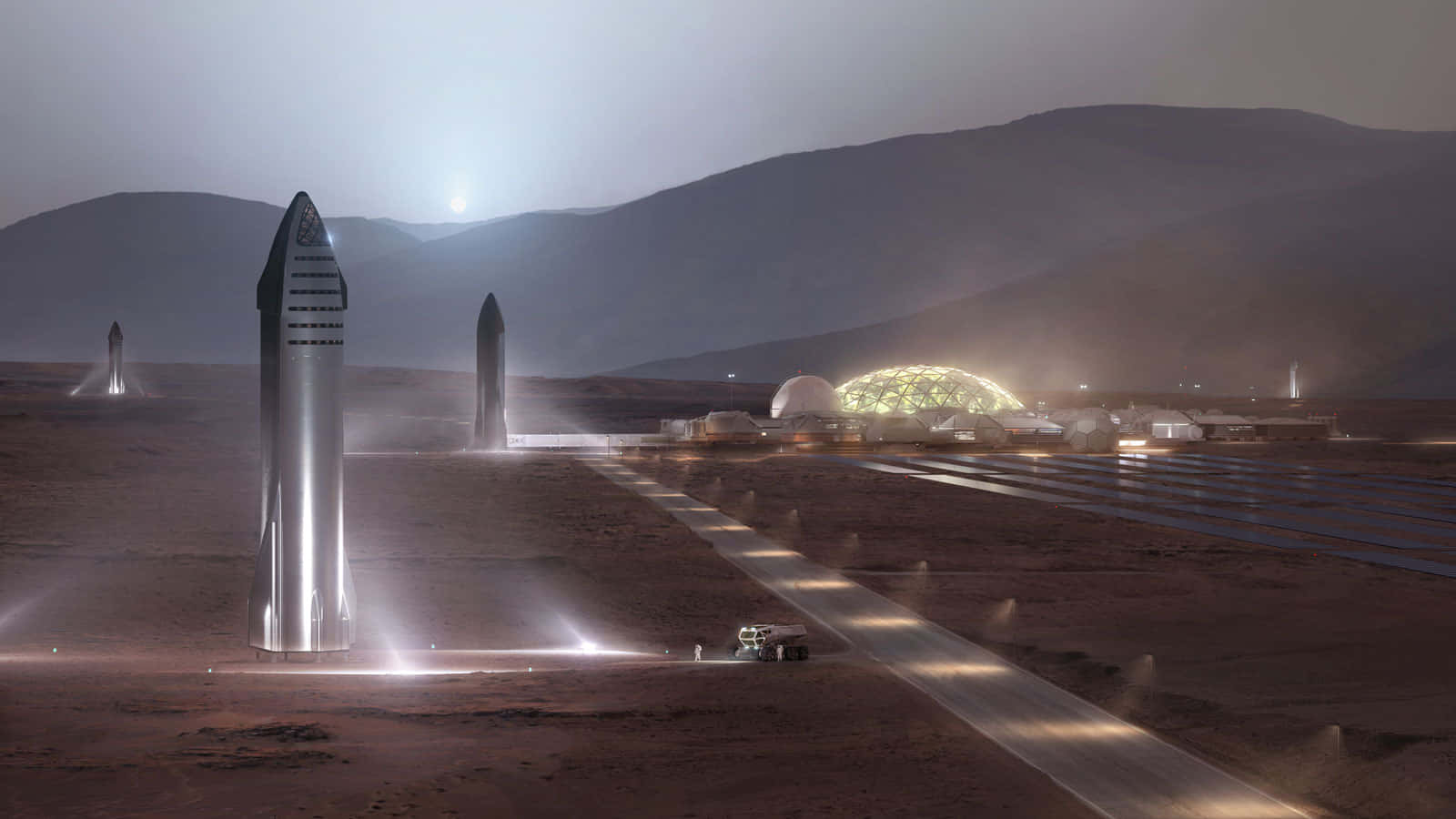 Spaceship 桌布 壁紙 — 未來火星殖民地，發光圓頂和Starship火箭在朦朧天空下高聳矗立。