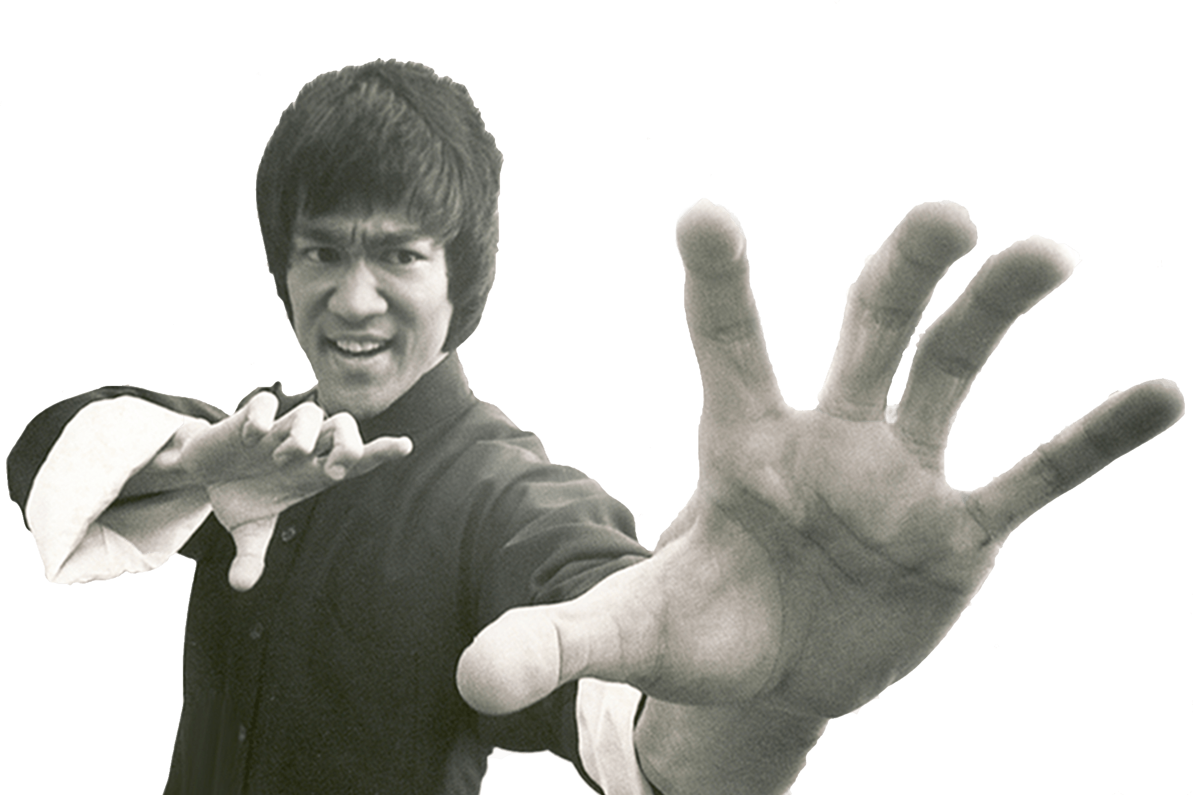 李小龍 桌布 壁紙 — 李小龍以黑白風格擺出動態武術姿勢，一隻手向前伸展。