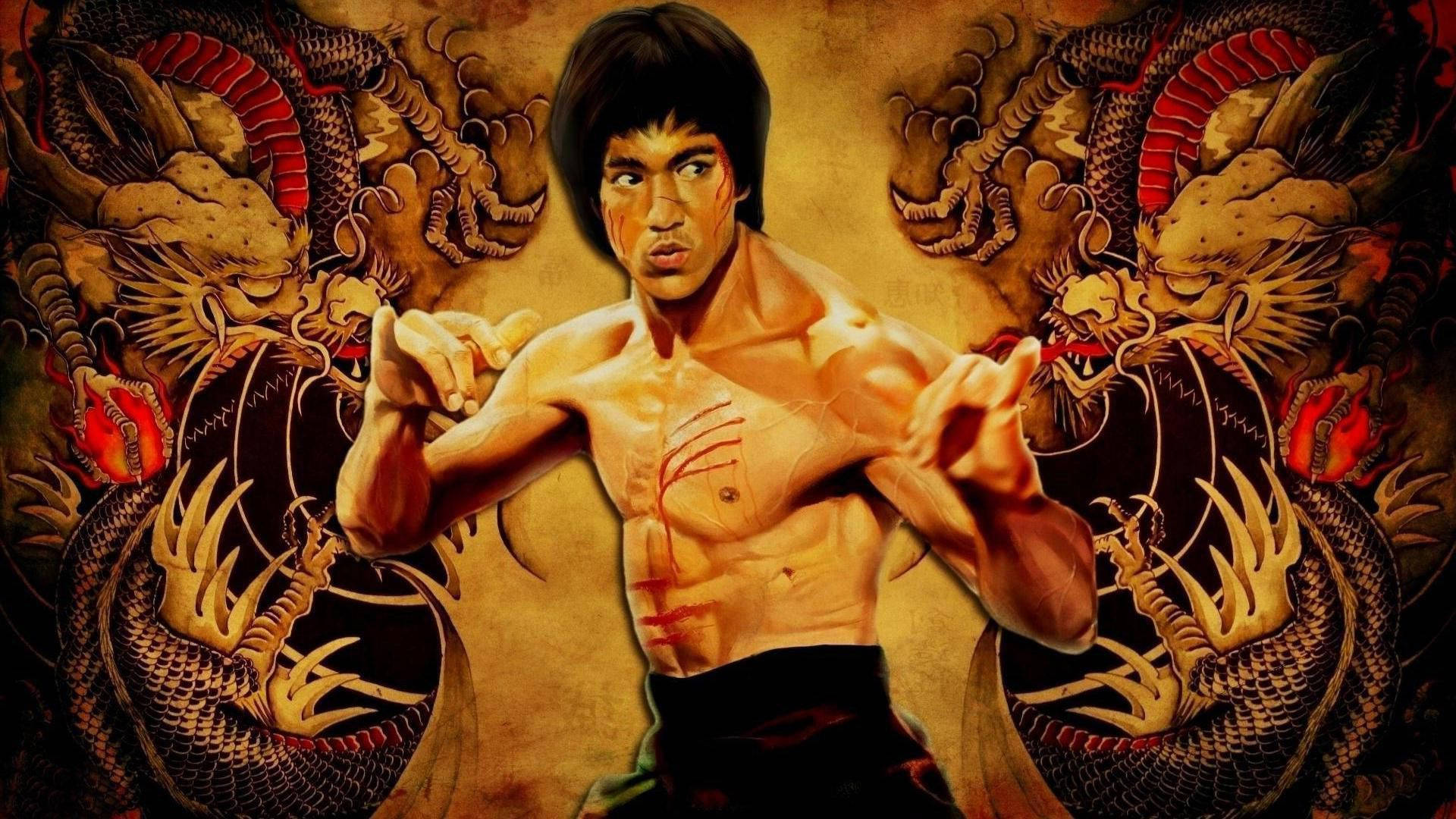 李小龍 桌布 壁紙 — 李小龍擺出戰鬥姿勢，兩側有兩條華麗的龍，背景是帶紋理的金色。