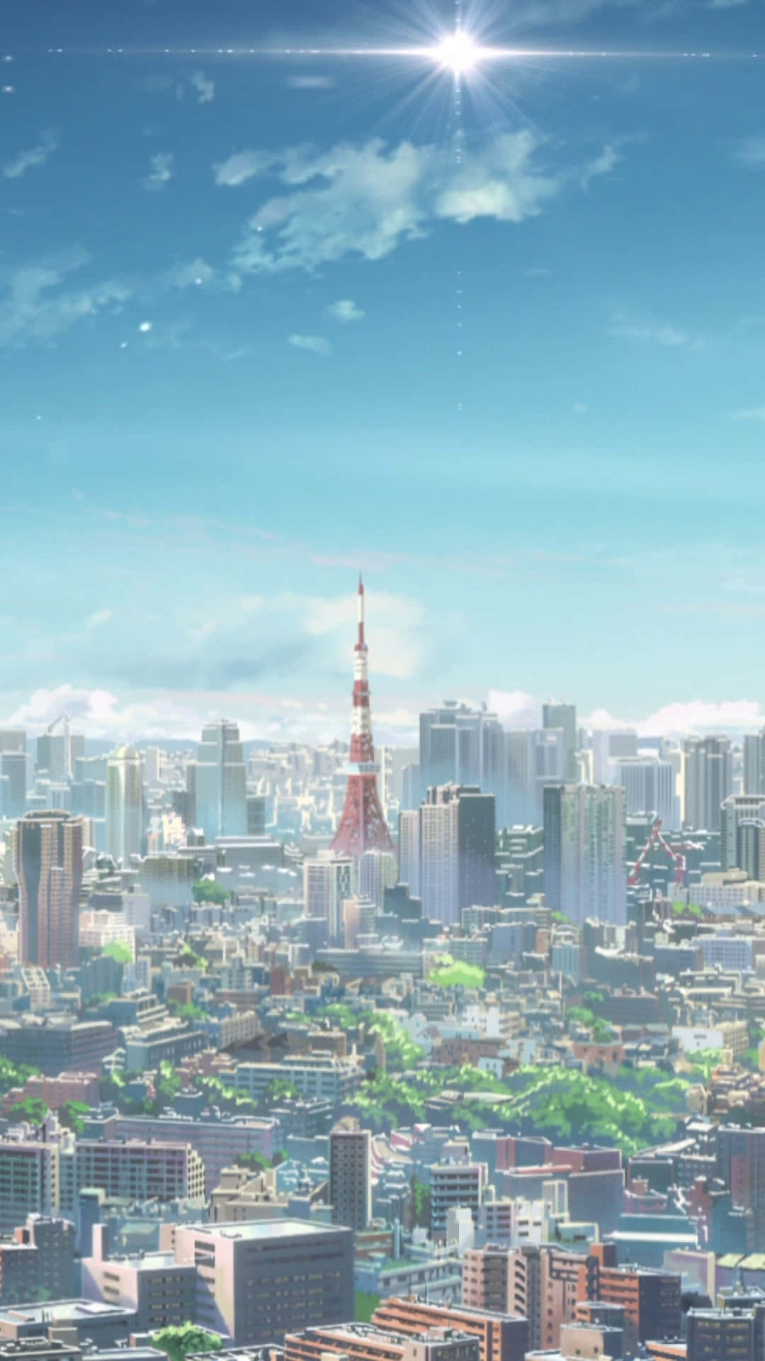 東京 桌布 壁紙 — 東京晴朗陽光普照的一天，標誌性的塔樓在晴朗的藍天下從密集的城市景觀中升起。