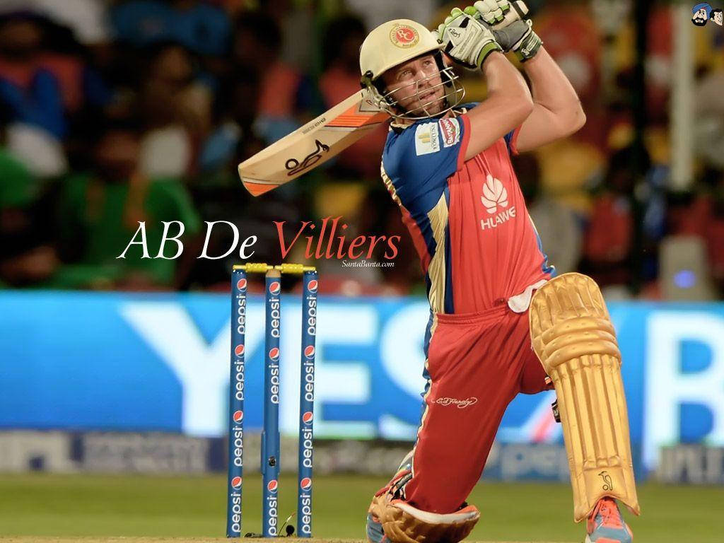 royal challengers bangalore 桌布 壁紙 — 板球運動員 AB De Villiers 身穿紅藍球衣，在夜間比賽的球場燈光下強力揮棒。