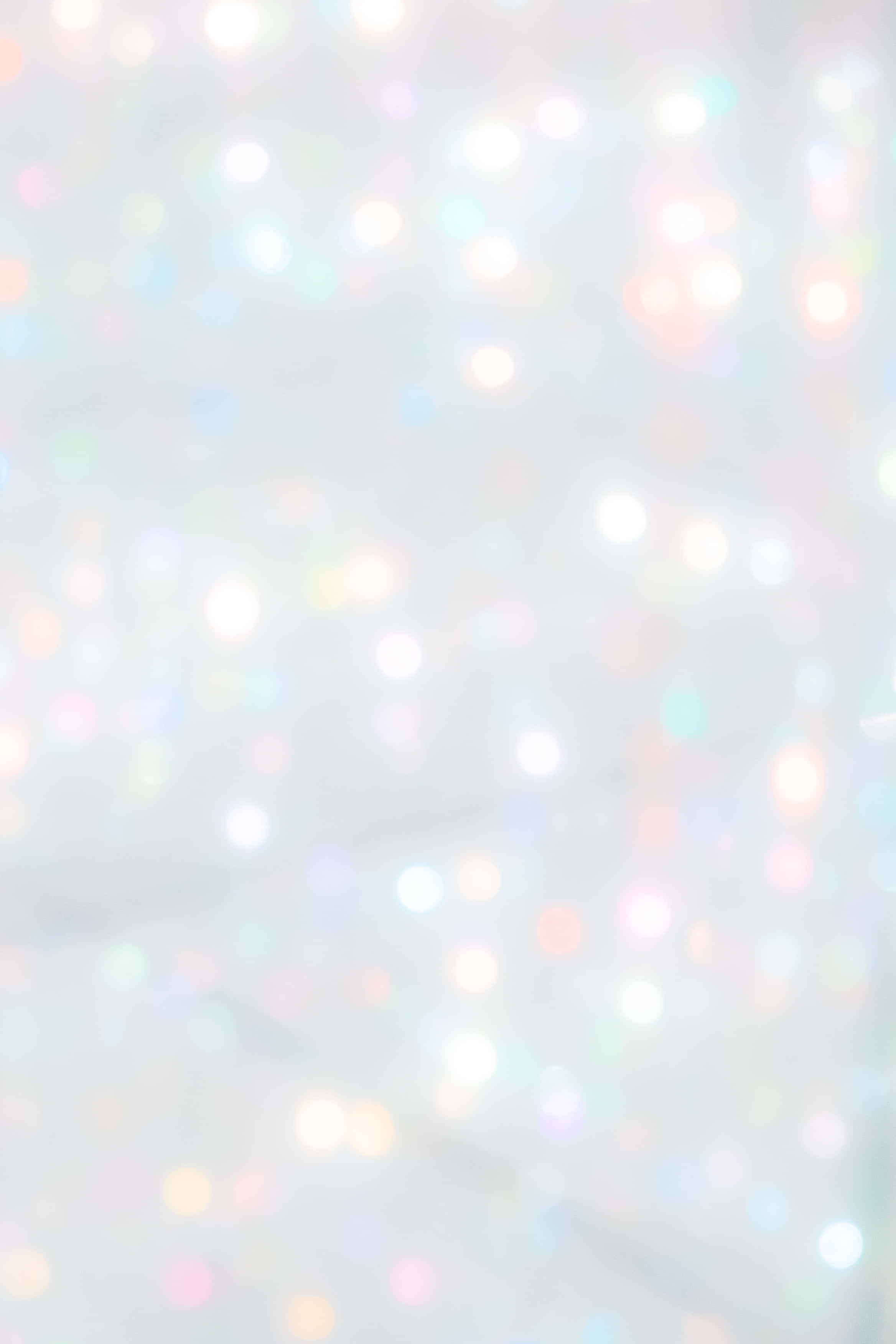 Sparkle 桌布 壁紙 — 柔和夢幻的背景，粉彩散景燈光在淺灰色薄霧中輕輕閃爍。